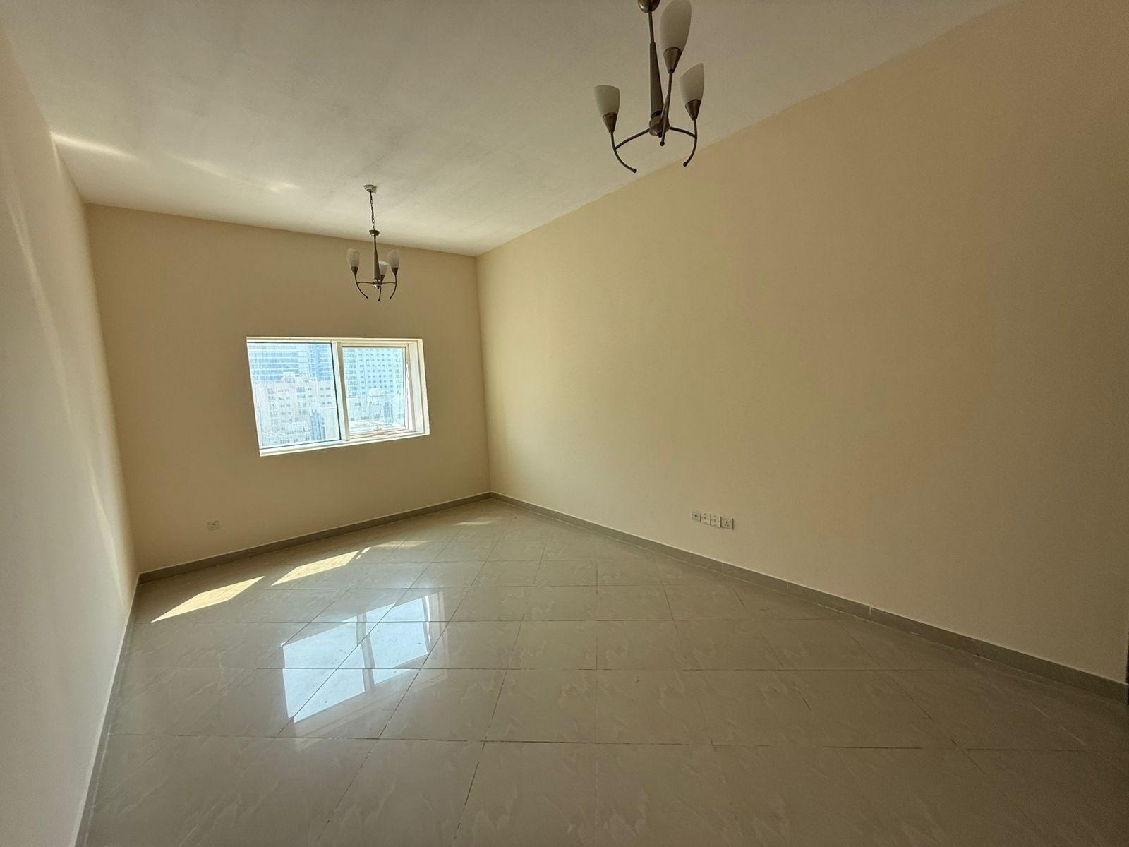 Free AC, gym and pool, large space with deluxe finish, lively location opposite Al Majaz waterfront, close to all services.