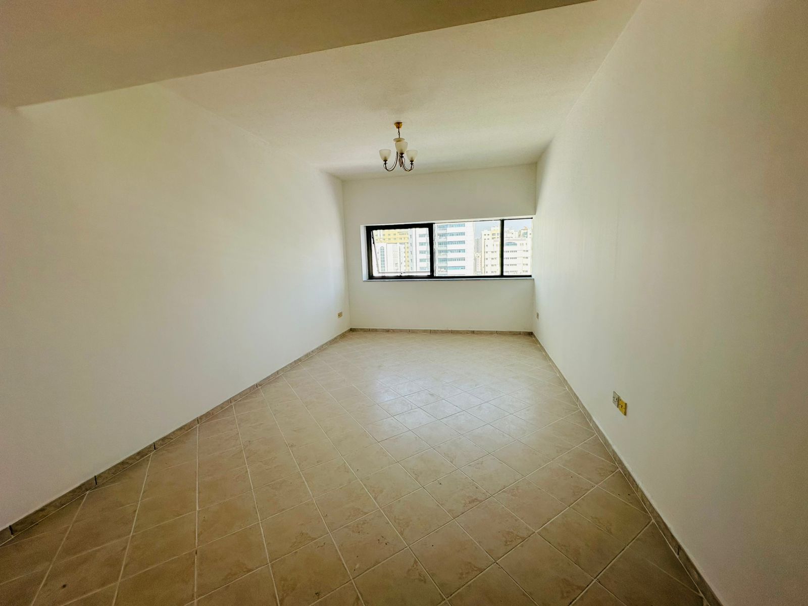 The most beautiful 1-bedroom apartment with a large living room, free AC, and an open view in Al Majaz 1.