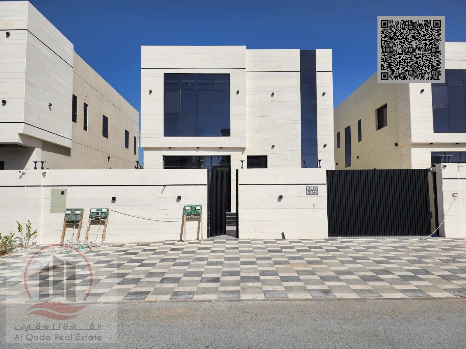 Villa for sale in Ajman, Al Zahia area, including registration. 4 master bedrooms, living room, majlis, maid's room, and bank financing available.
