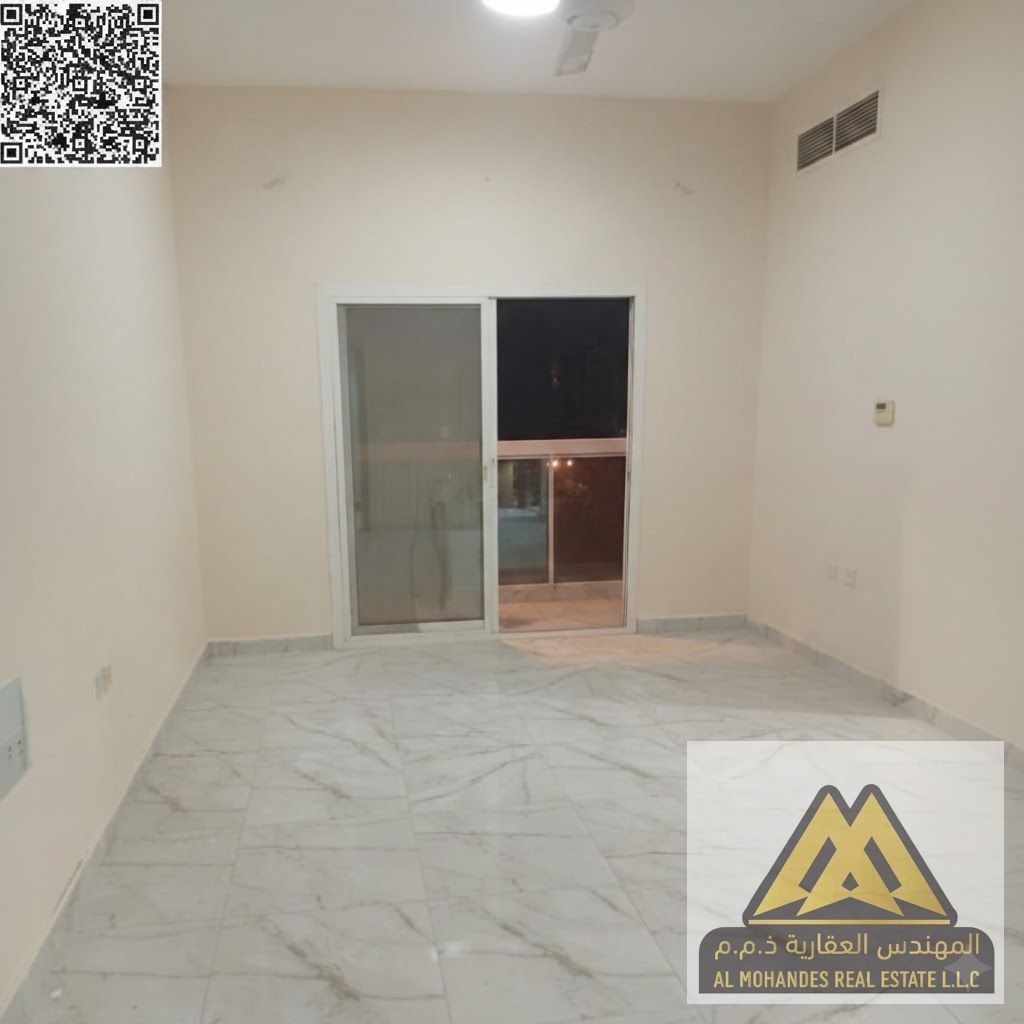 Master Bedroom | Prime Location Close to All Amenities and Easy Access to All Emirates | Balcony with Open View | For Families Only Location: Al Nuaim
