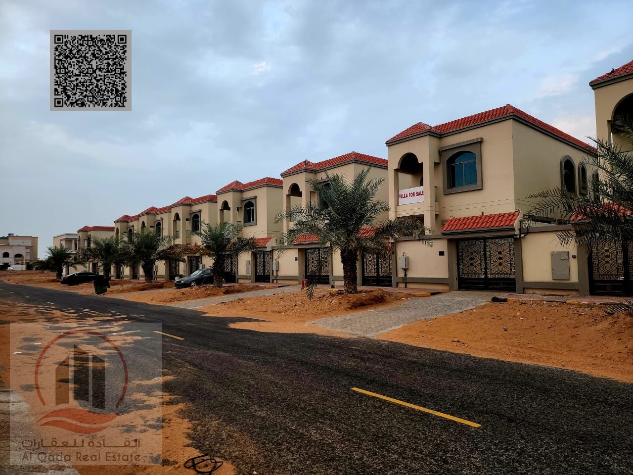Villa for sale in Ajman, Al Helio area, including registration, 4 master bedrooms, majlis, living room, maid's room, and bank financing available.