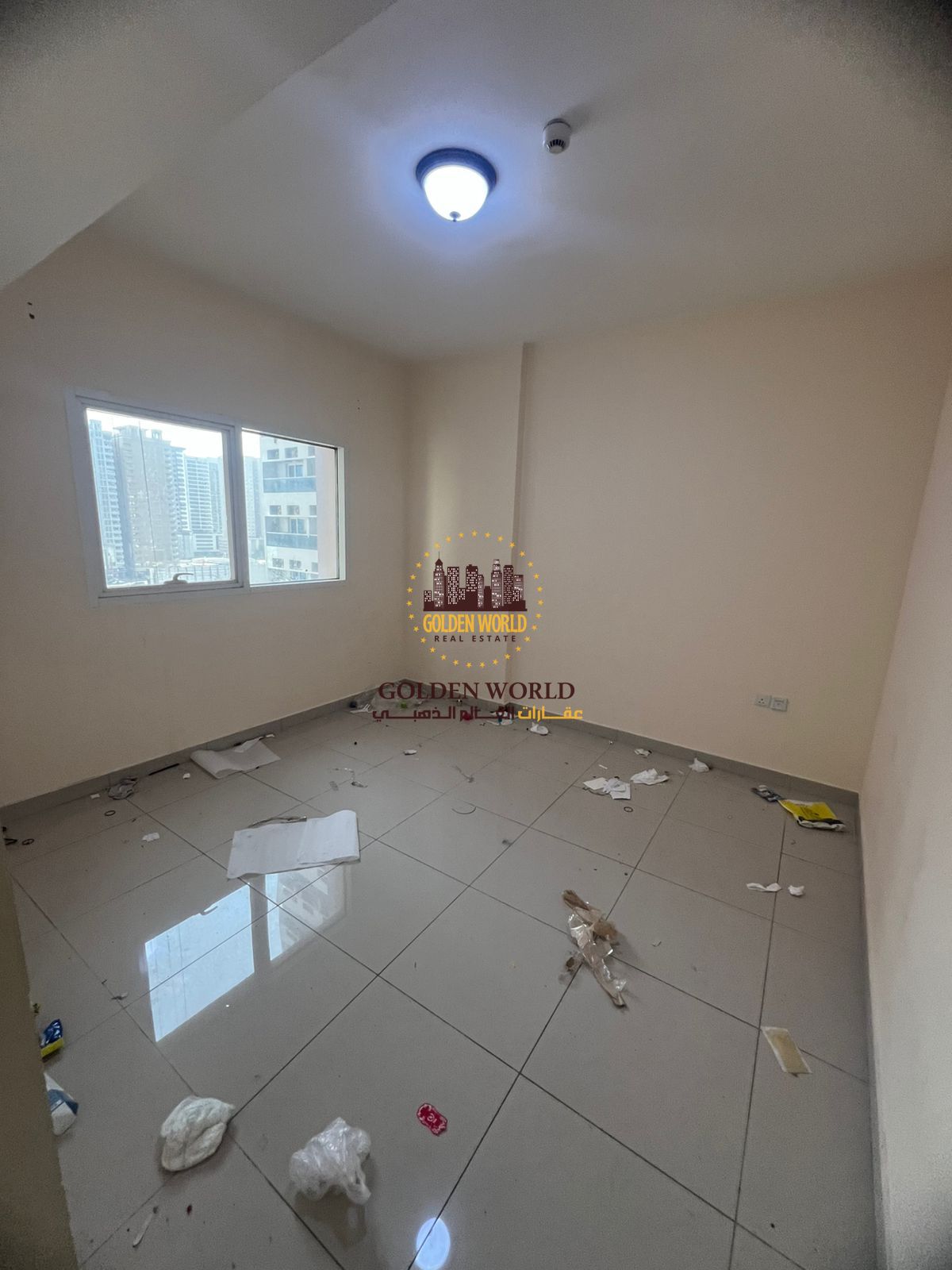 Two-bedroom + living room in Al Taawun, Sharjah. Balcony, 2 baths, family building, 24/7 security, clean apartment, AED 45,000/year, first installment