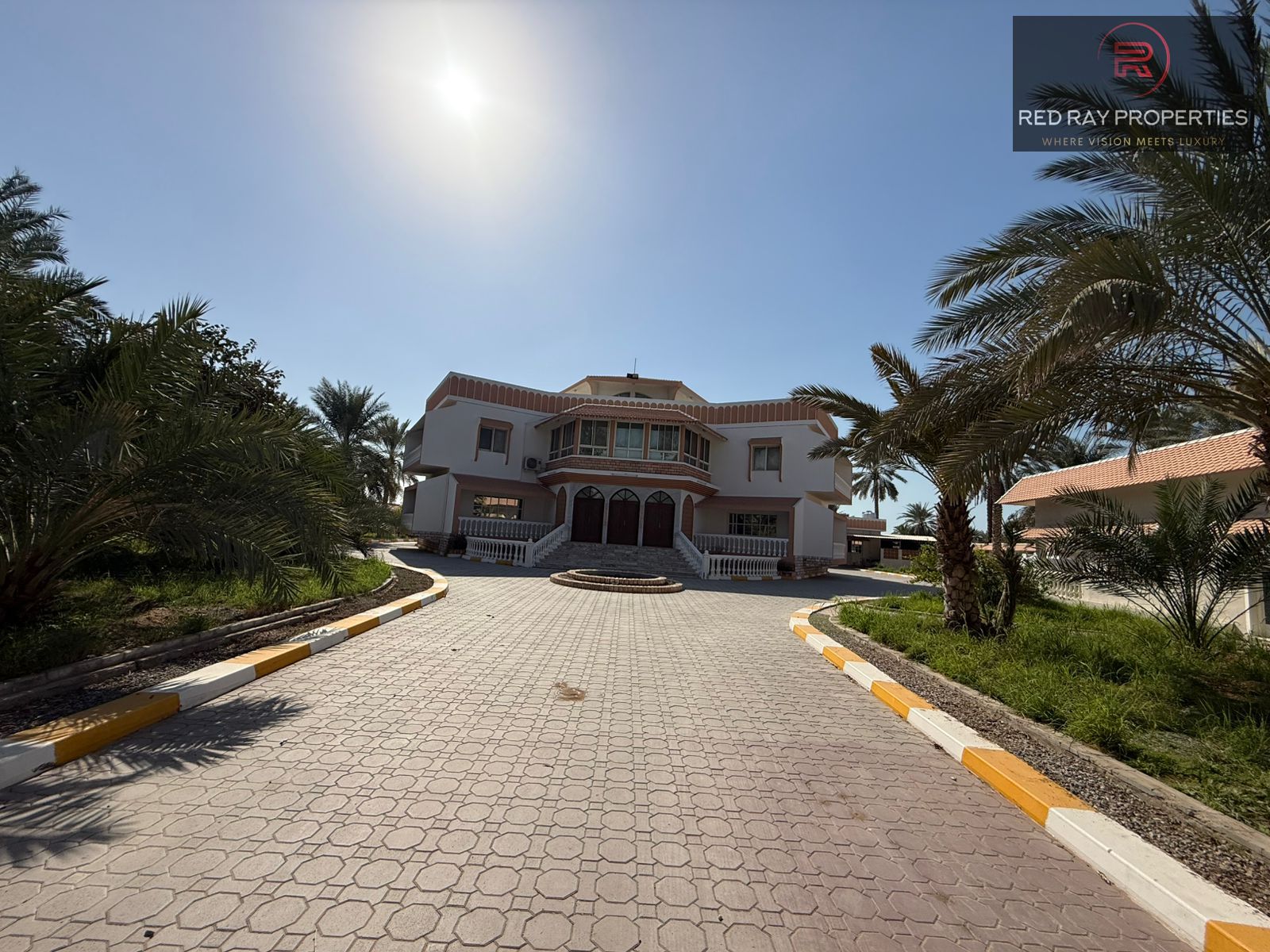 Spacious 9-Bedroom Corner Villa for Rent in Julfar