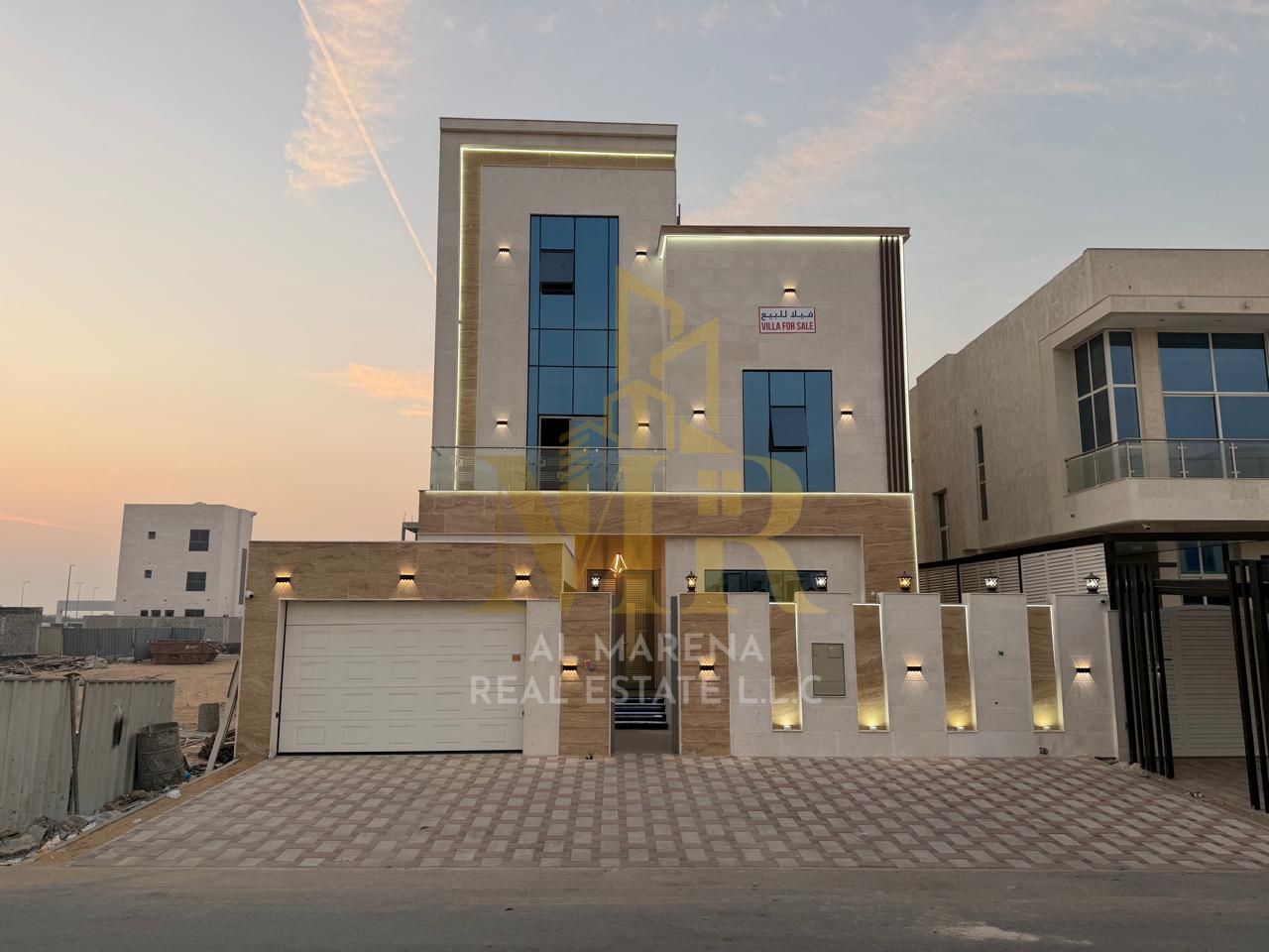 Luxury villa for sale in Al Bahia, featuring two floors and a rooftop terrace. Modern design, spacious living areas, and complete family amenities. Fr