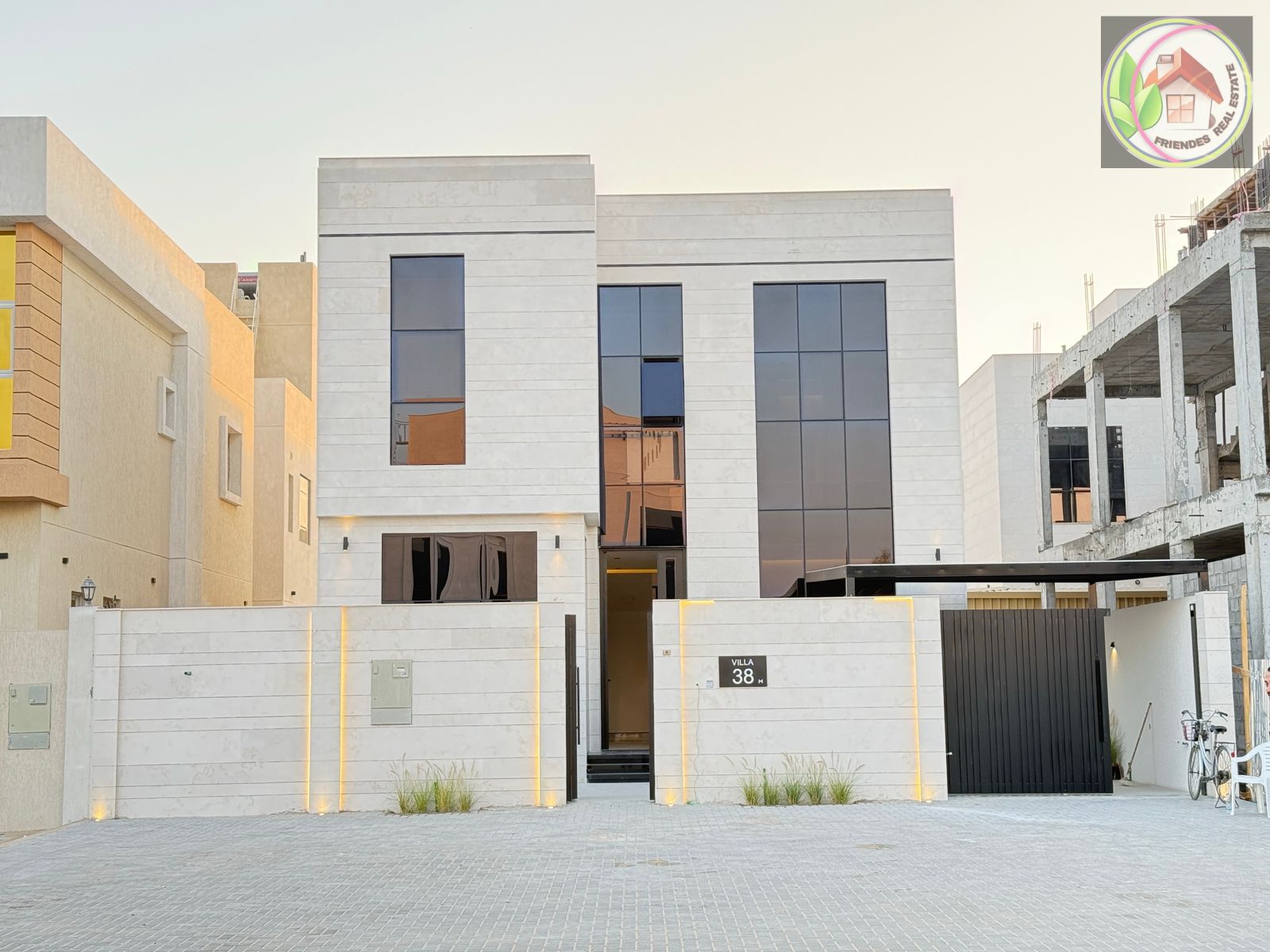 Villa including registration fees. Own your dream villa, two floors and a roof, super deluxe finishing, in Al Zahia area, directly on Sheikh Mohammed