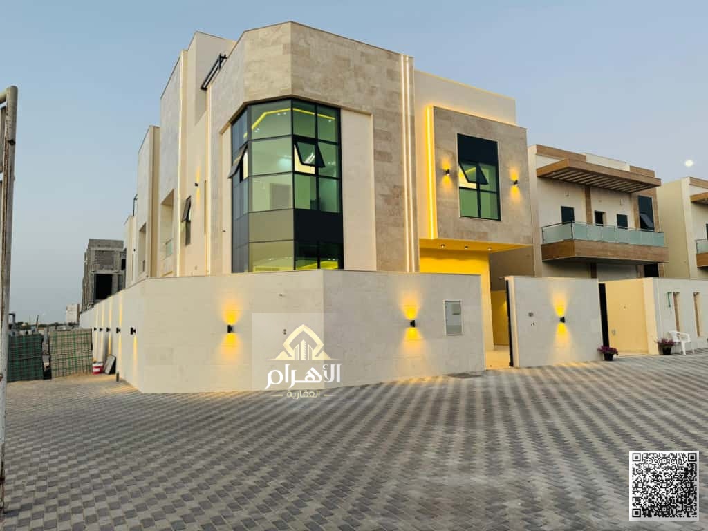 Corner villa on two paved streets in Al Helio 2 area, Ajman - close to the mosque and Sheikh Mohammed Bin Zayed Road. - Ground floor + 2 floors + perg