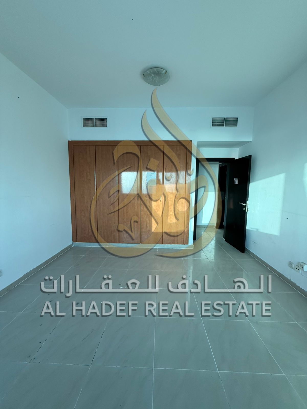 Two-bedroom apartment with maid's room + gym + swimming pool + tennis court + children's walkway + free parking