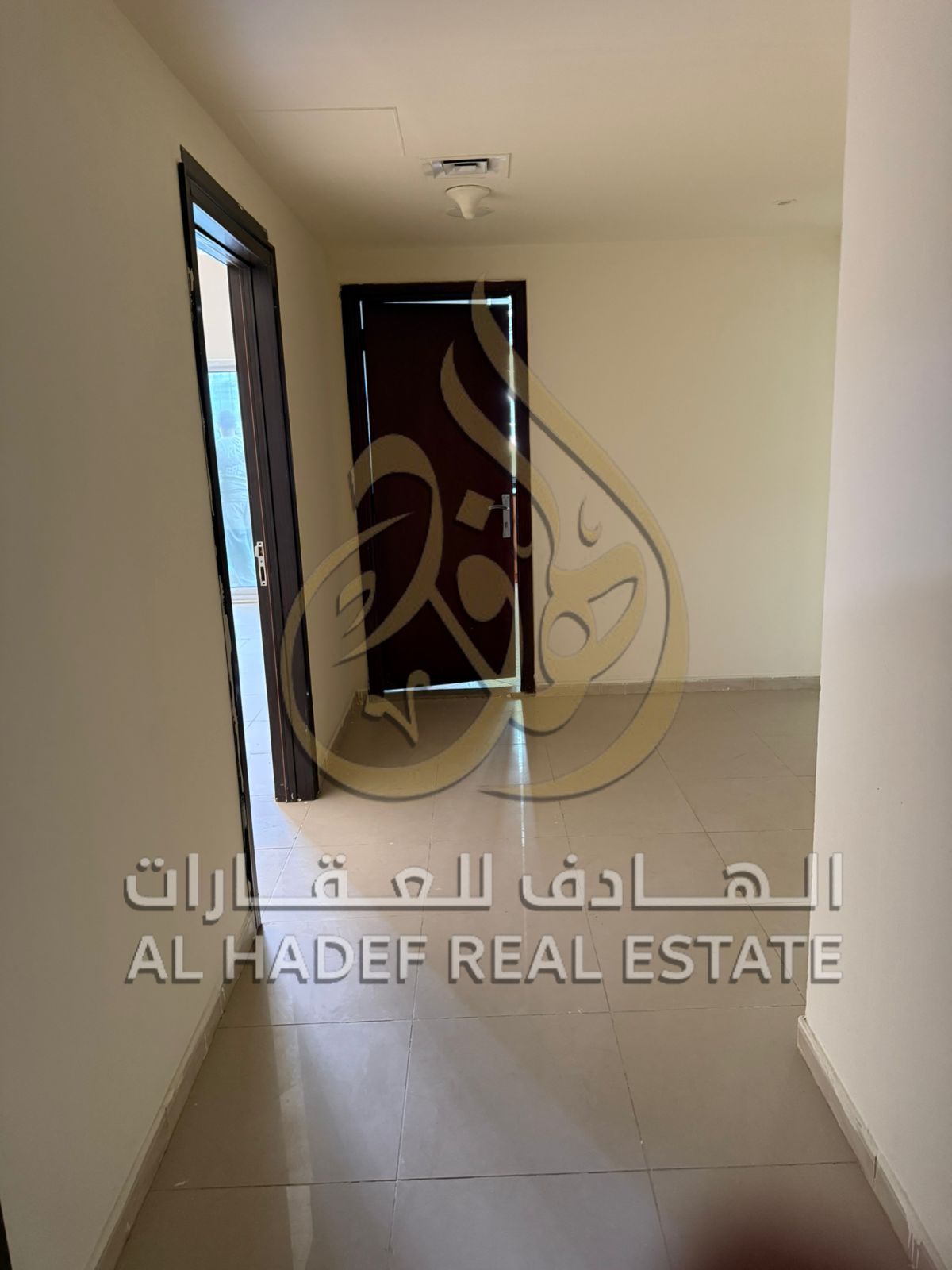 Apartment for rent in Al Taawun Tower 1, first row on the Corniche, 2 bedrooms with separate hall, distributor and 3 bathrooms, 4 cheques, prime locat