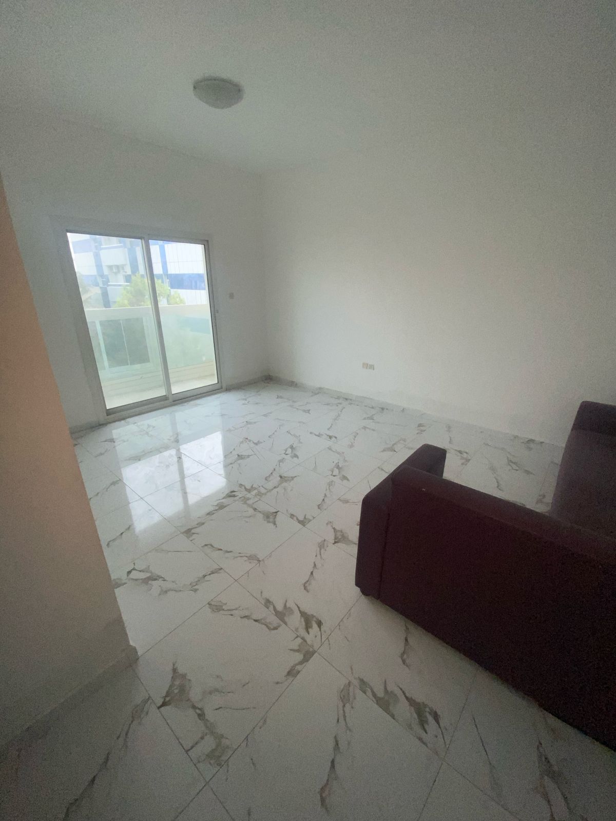 Two rooms and a living room, second-hand, in Al-Rashidiya 2, behind the Ladies' Park, spacious.