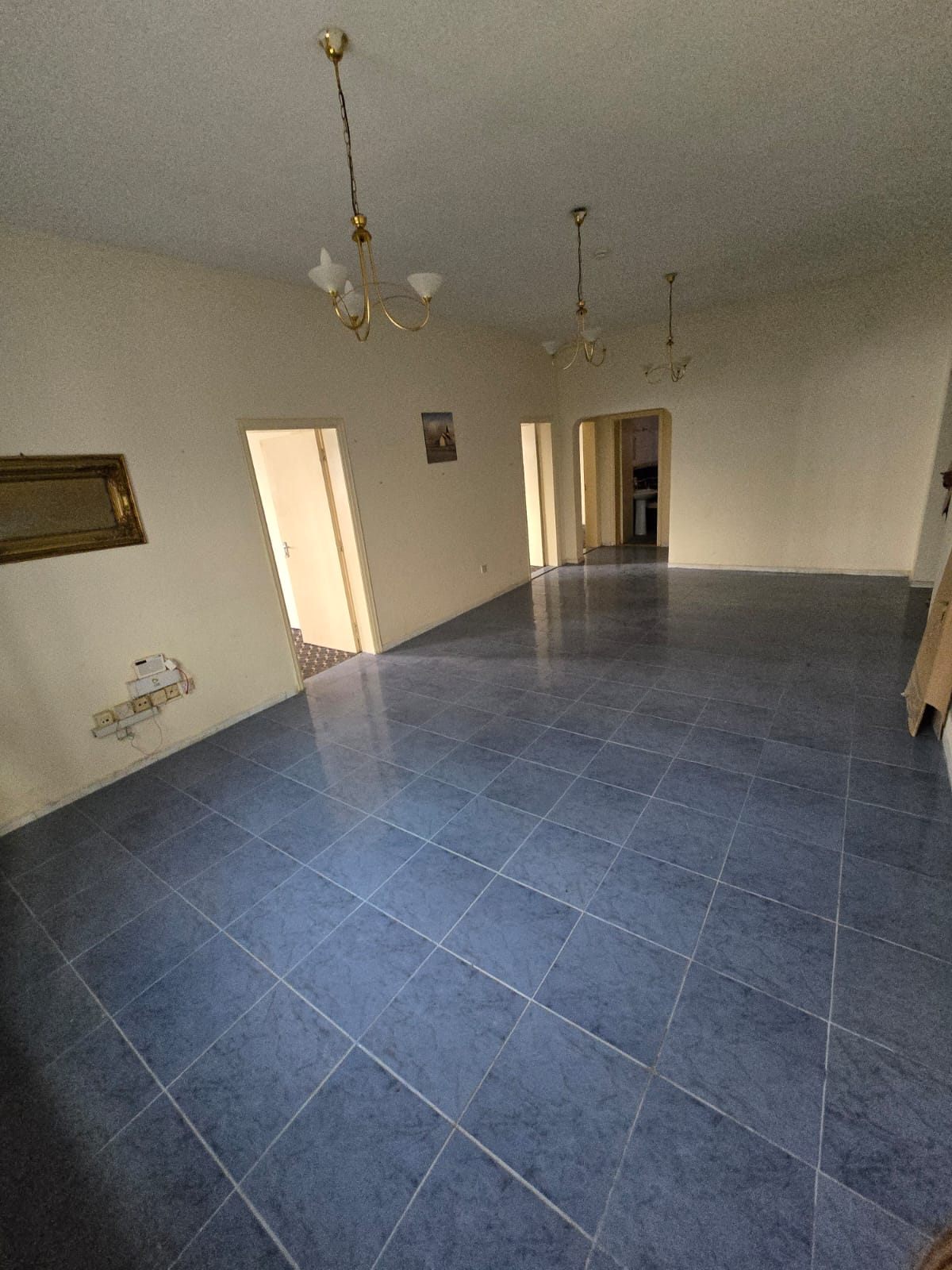 Annual rent apartment in Al Majaz 3, featuring 3 bedrooms and a living room with a large area and 2 balconies. Ideal for families, located in a prime