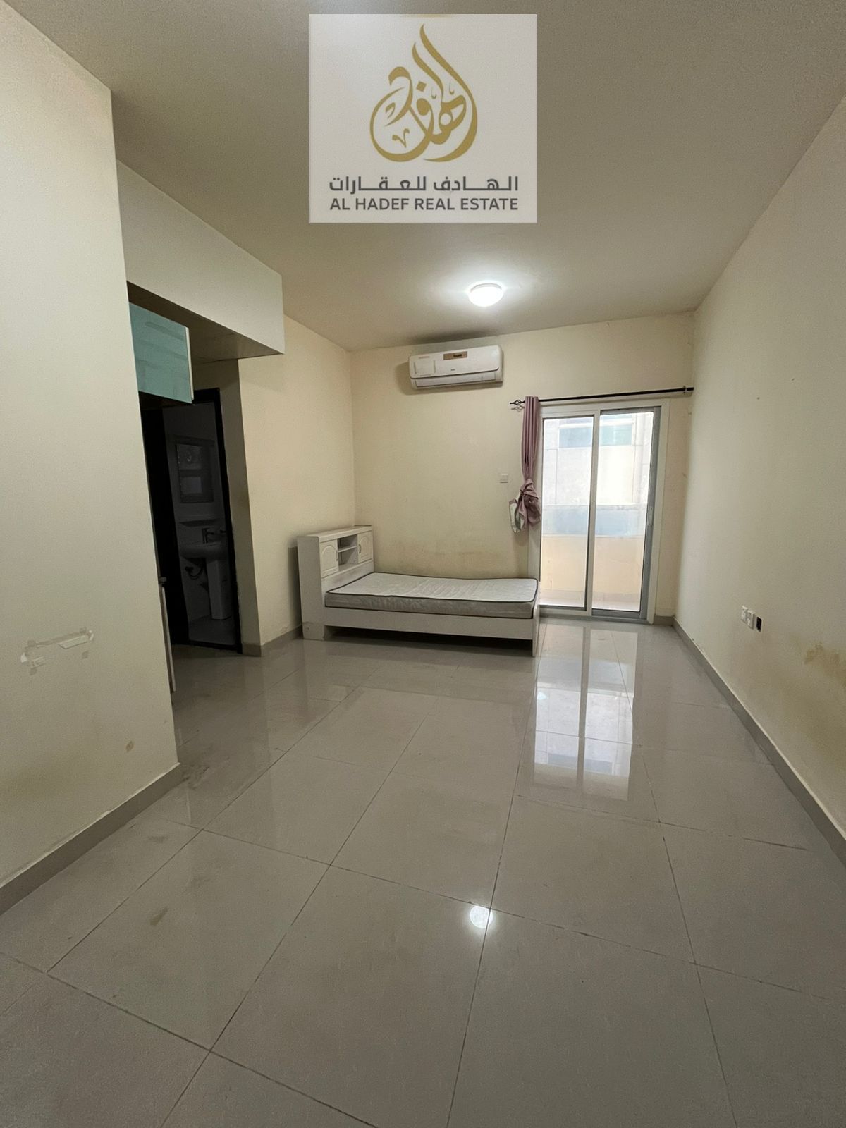 Al Jurf 2, opposite Ajman Court and close to all services, two bedrooms and a living room