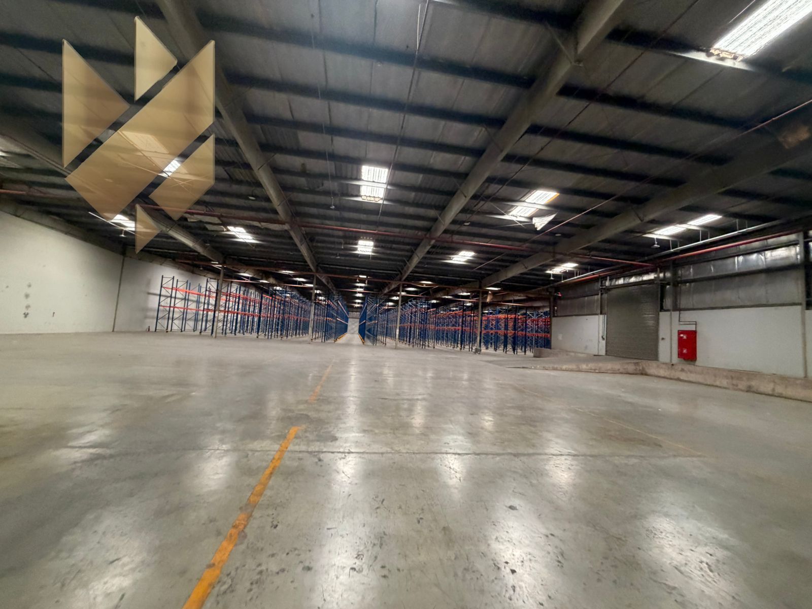 On main road with private entrance, parking, 125,000 sqft, 4 offices & prayer room, 6 main doors, 4 rear doors, 55 kW power, negotiable.