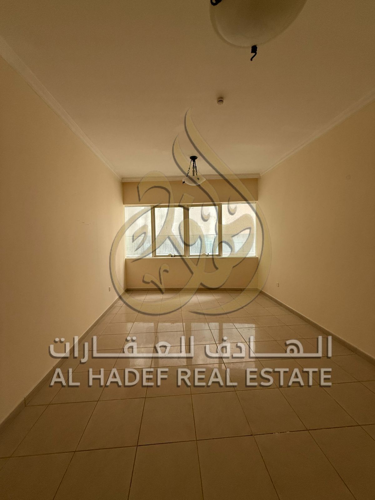 Apartment for rent in Al Taawun, 2 bedrooms and hall with maid’s room and balcony, separate hall with distributor, near W Wilson Hospital, 4 or 6 cheq