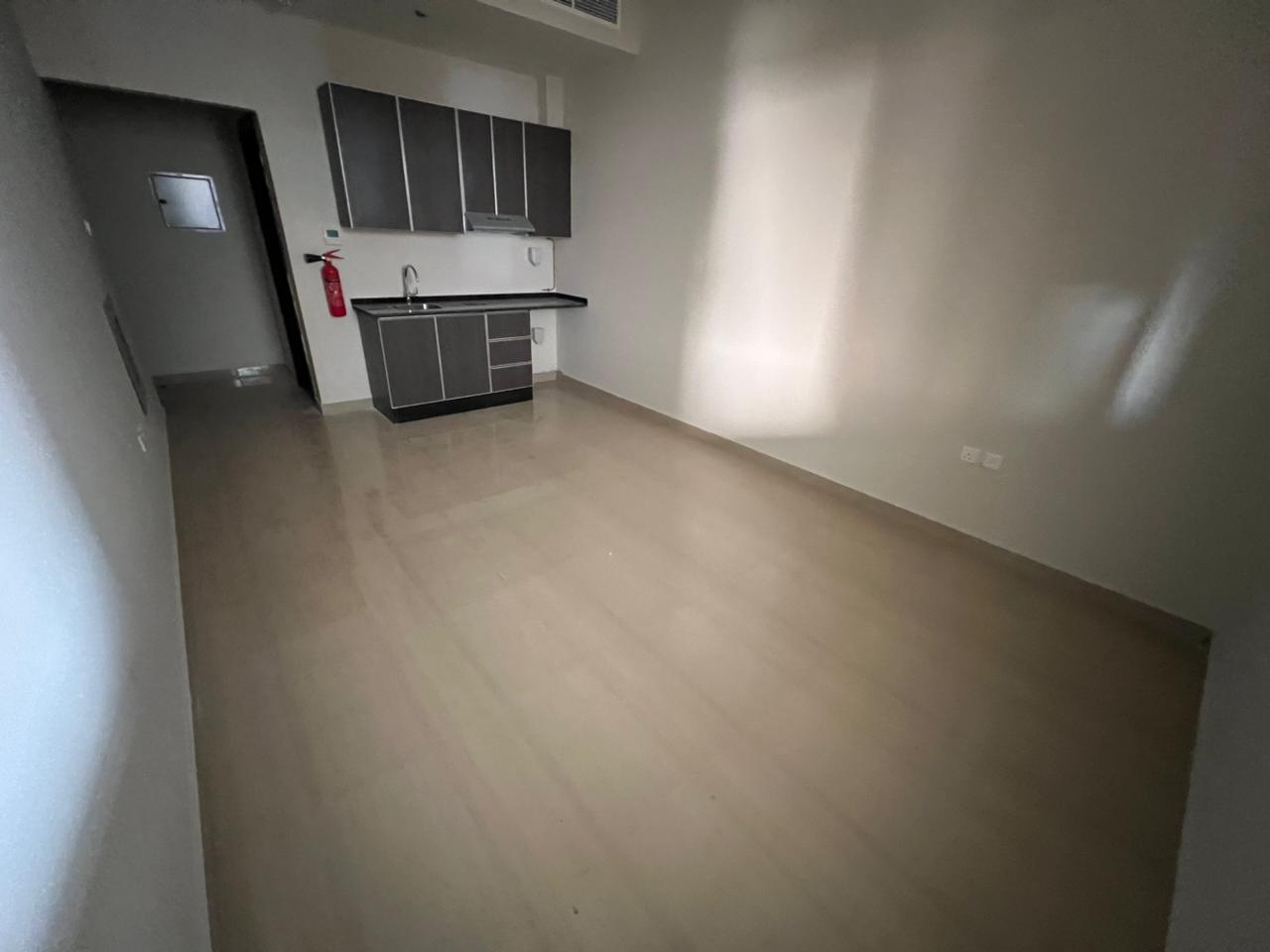 Brand new building, first occupancy, for annual rent in Ajman. Studio apartment, first occupancy, Al Muwaihat 3, excellent size.