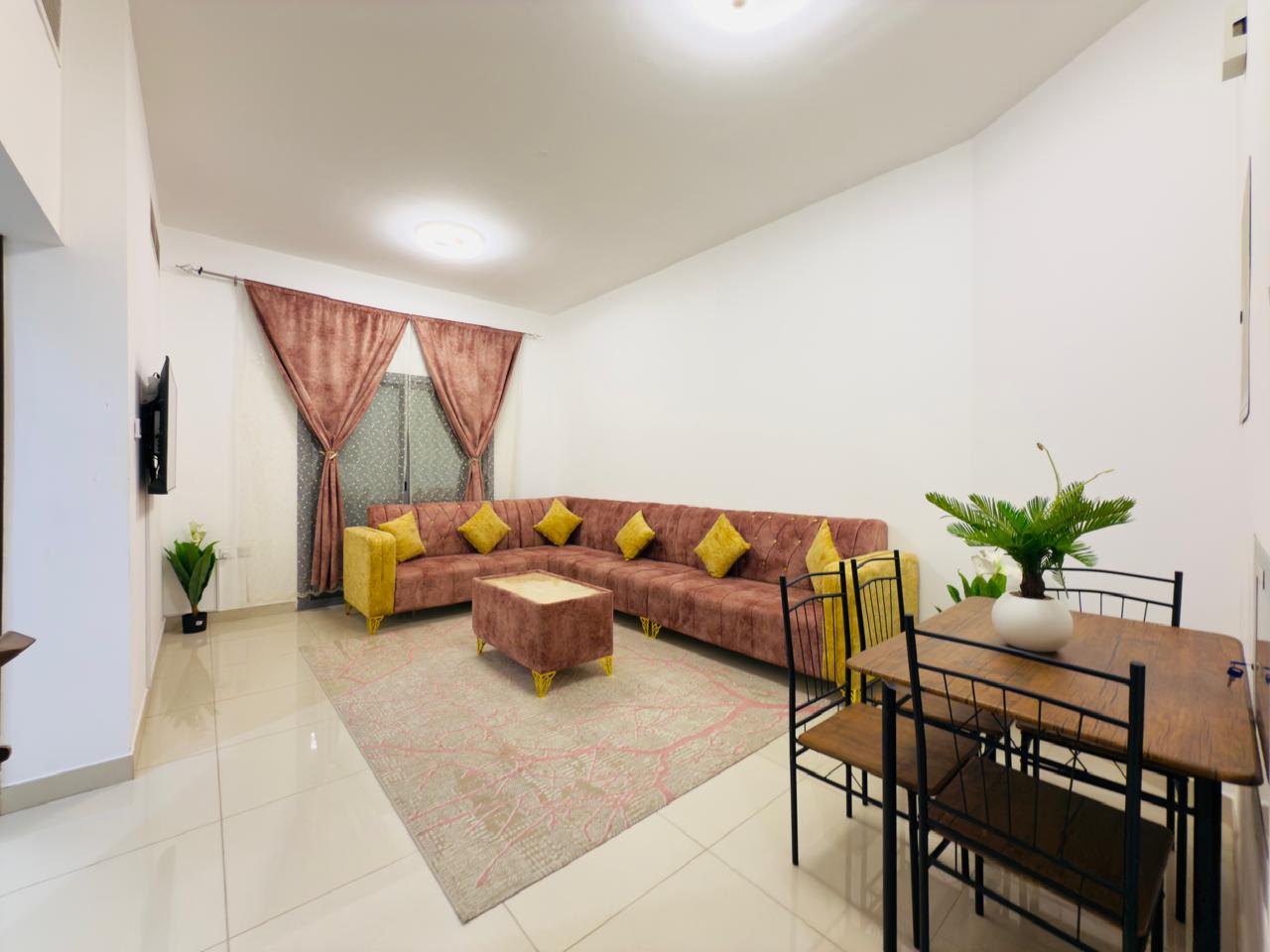 Newly furnished apartment with a balcony, two bathrooms, and central air conditioning.