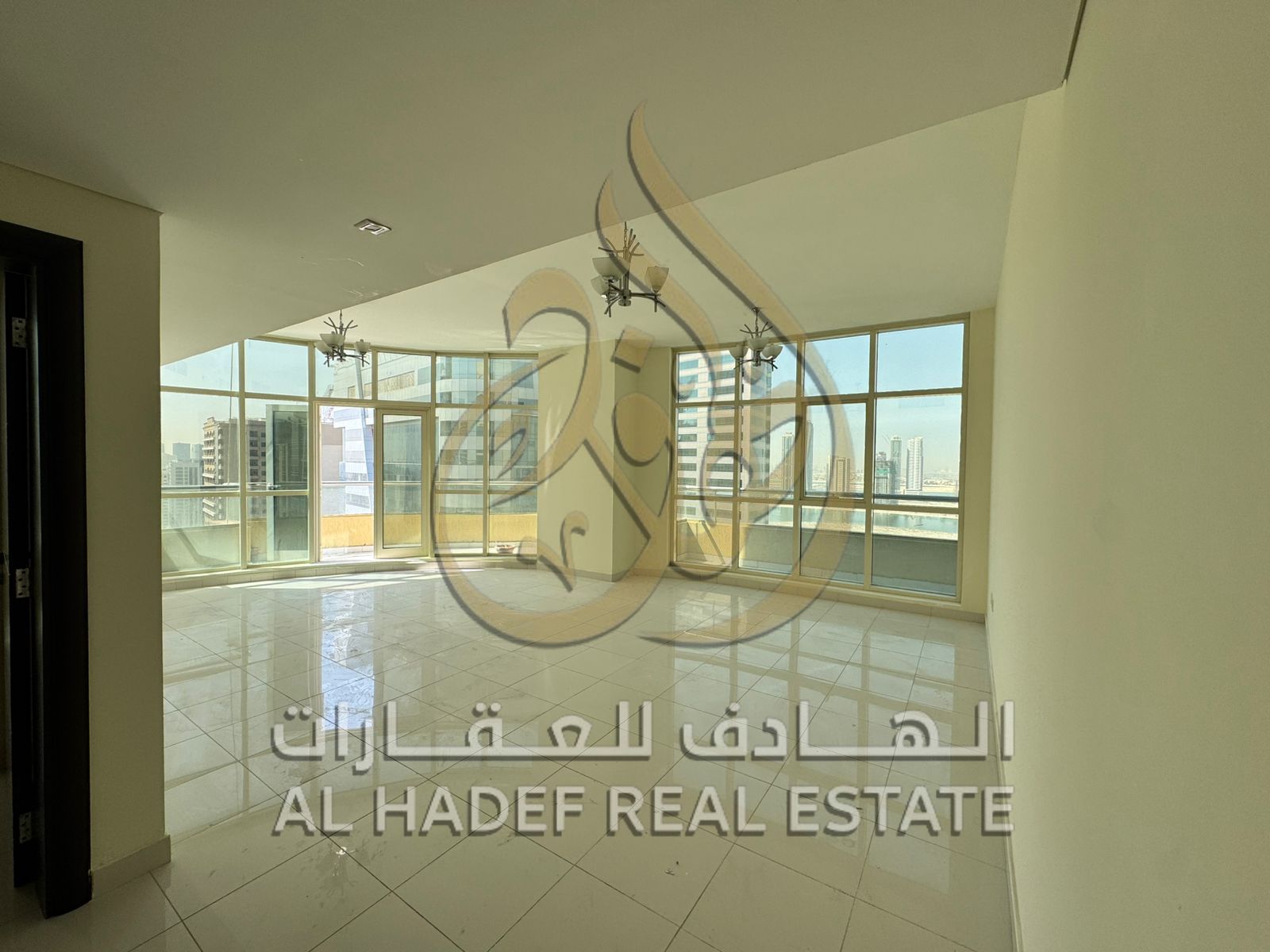 For rent in Al Khan - 3 rooms and a hall + free parking + free maintenance + swimming pool and gym for women/men