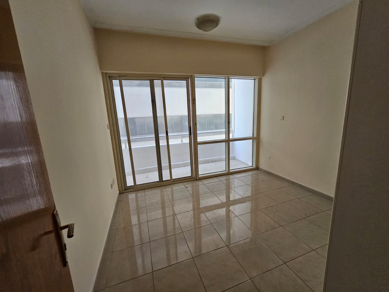 Beautiful 2-Bedroom + Living Room Apartment Spacious layout with open view and balcony Wall closets Close to all amenities Near Dubai exit
