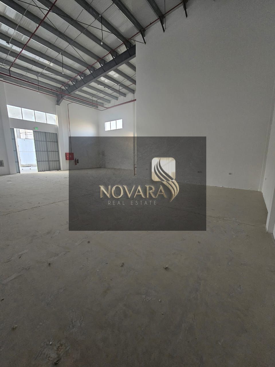 Warehouse in Al Jurf Industrial Area 3, Ajman, 2680 sq ft, one floor, 30 kW electricity, strategic location, price 165,000 dirhams.