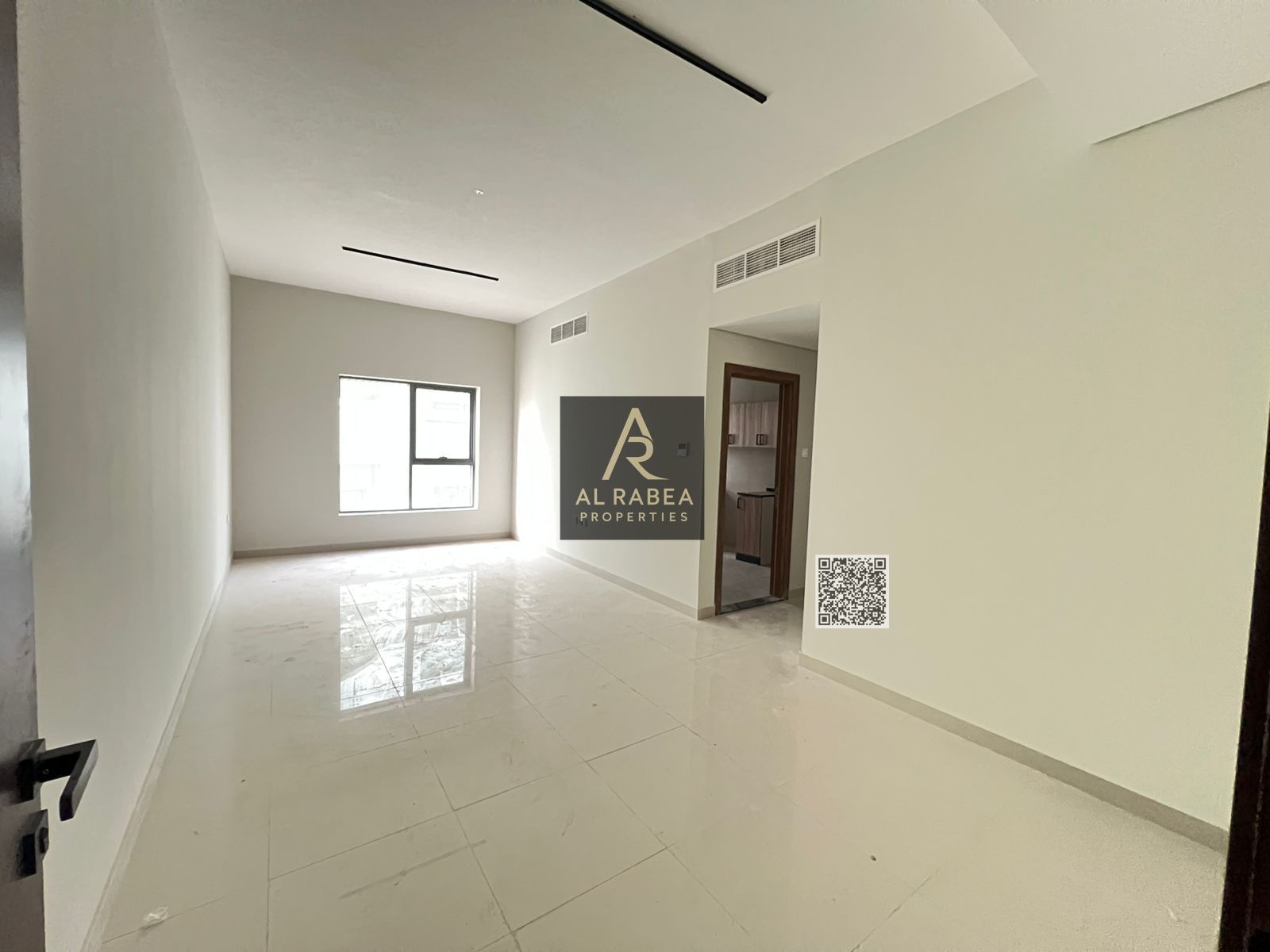 Two-bedroom apartment with a living room available for annual rent, first tenant, featuring a balcony, two bathrooms, and built-in wardrobes, located