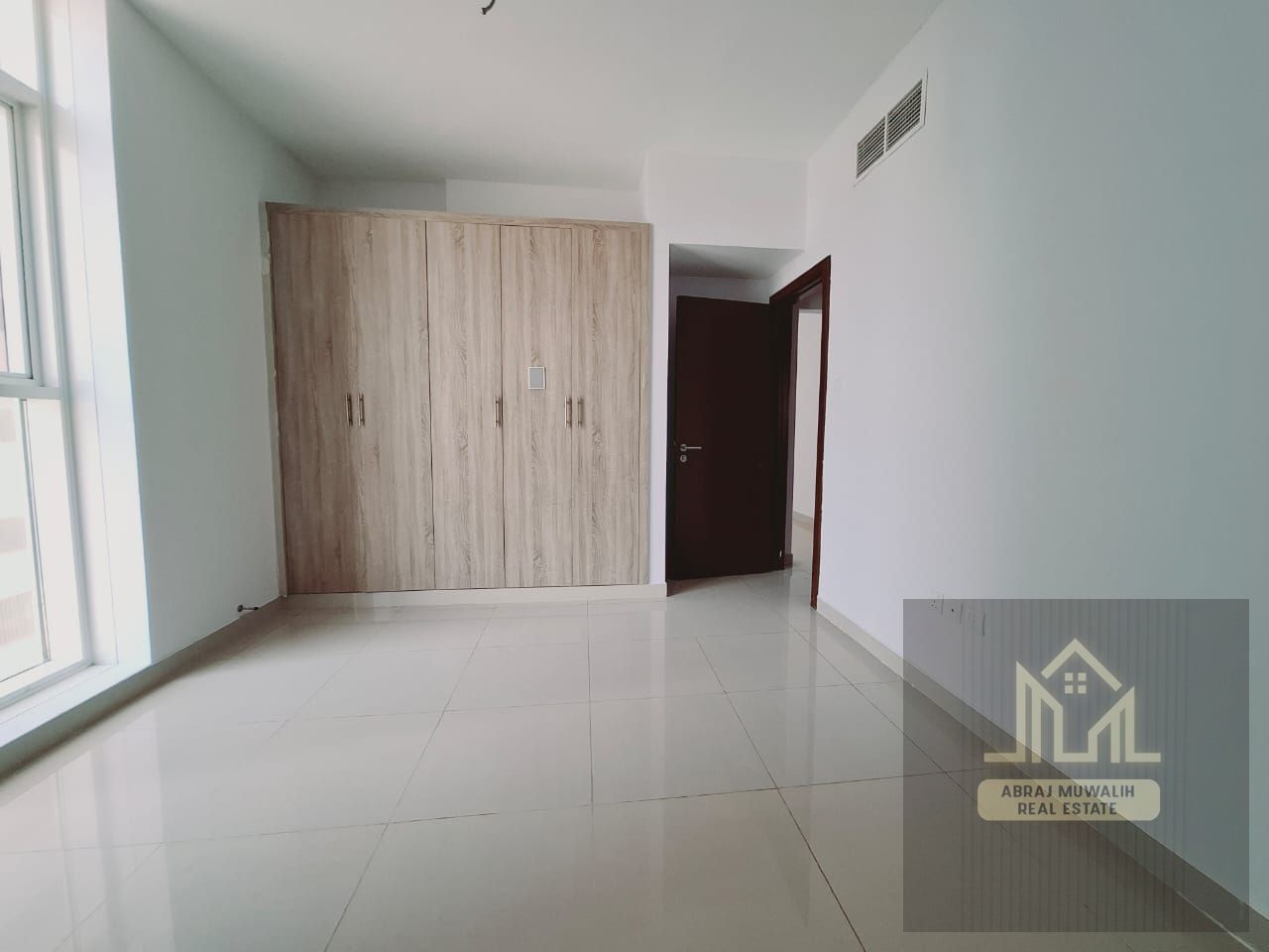 Spacious 1BHK with Balcony & Wardrobes | 30K Only | Abu Shagara