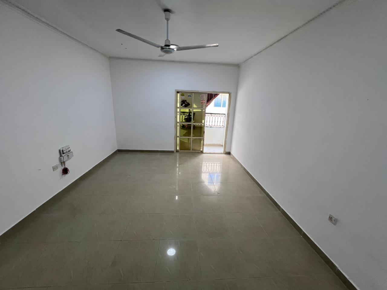 Apartment for annual rent in Ajman, one bedroom and living room, first floor without elevator, Al Rawda area, near Mohammed Bin Zayed Road