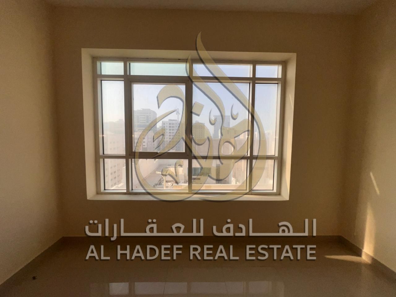 Here’s the English translation within 150 characters: **Beautiful 2-bedroom apartment with living room in Abu Shagara, spacious, excellent finishing,