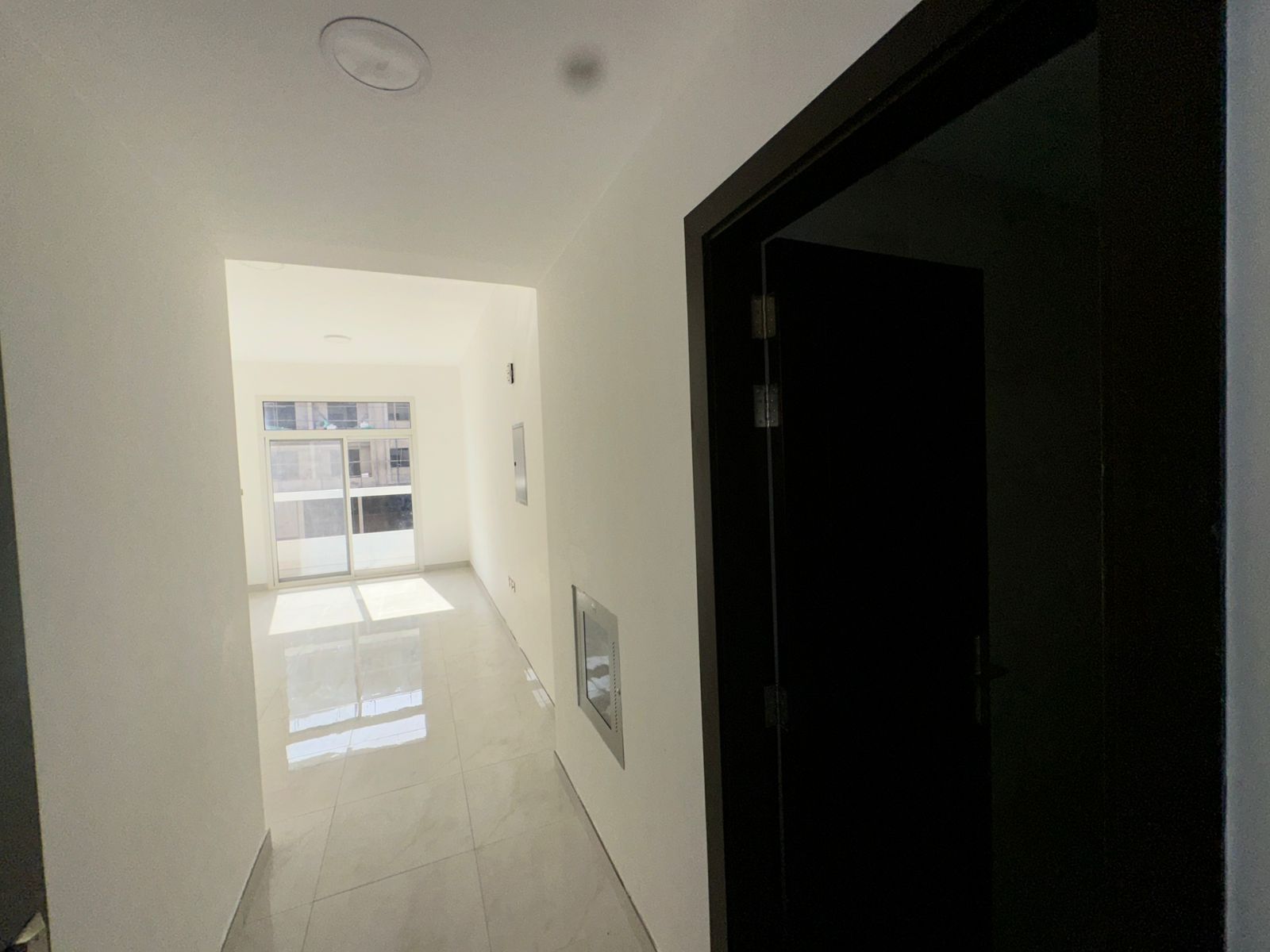 One bedroom, living room, two bathrooms, second owner, with water, 3 large spaces, near Mohammed Bin Zayed exit
