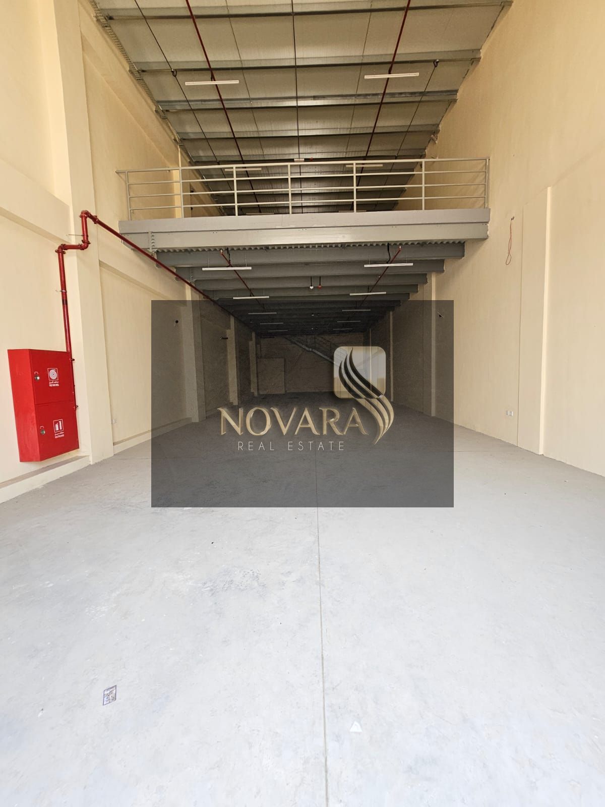 Warehouse in Ajman Industrial Area - Oman Street, 3600 sq ft with mezzanine, 22 kW electricity, strategic location, price 200,000 dirhams.