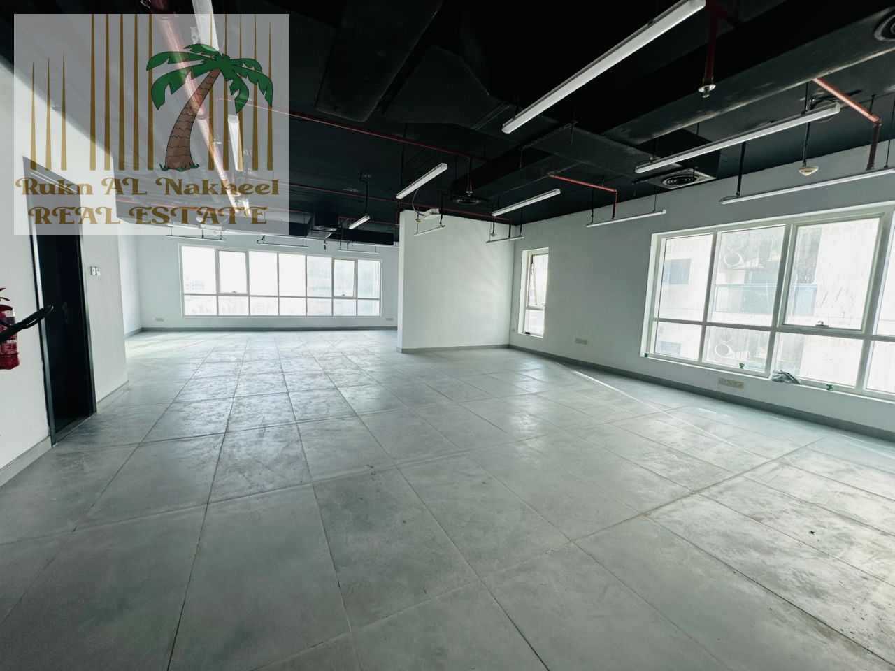 office for rent in prime location majaz Cornish side chiller free