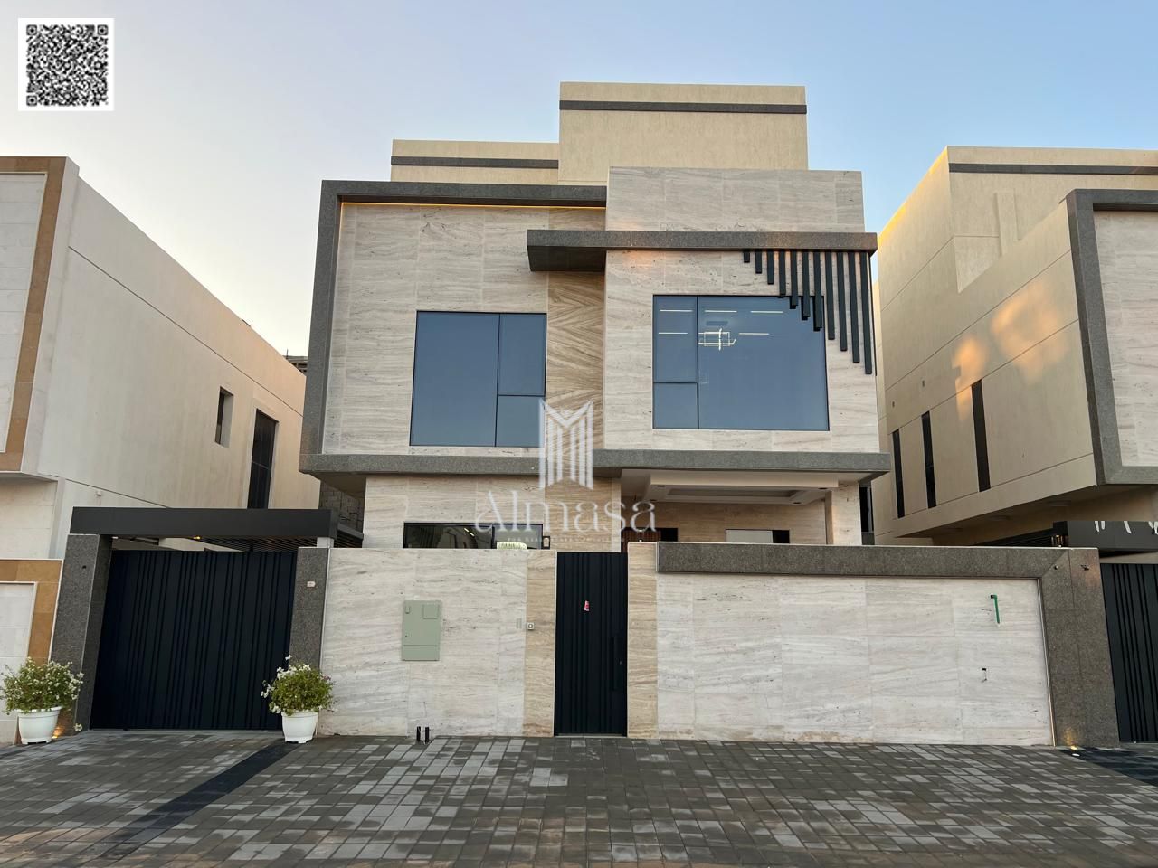 Luxury villa with European design, large area, two floors with roof + swimming pool for sale in Al Yasmin - prime location near the park and services.