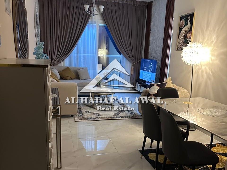 Two bedrooms and a living room, balcony with a view, 3 bathrooms, master bedroom, super deluxe furnished. Located in Al Taawun. Rent: 7,500 (including