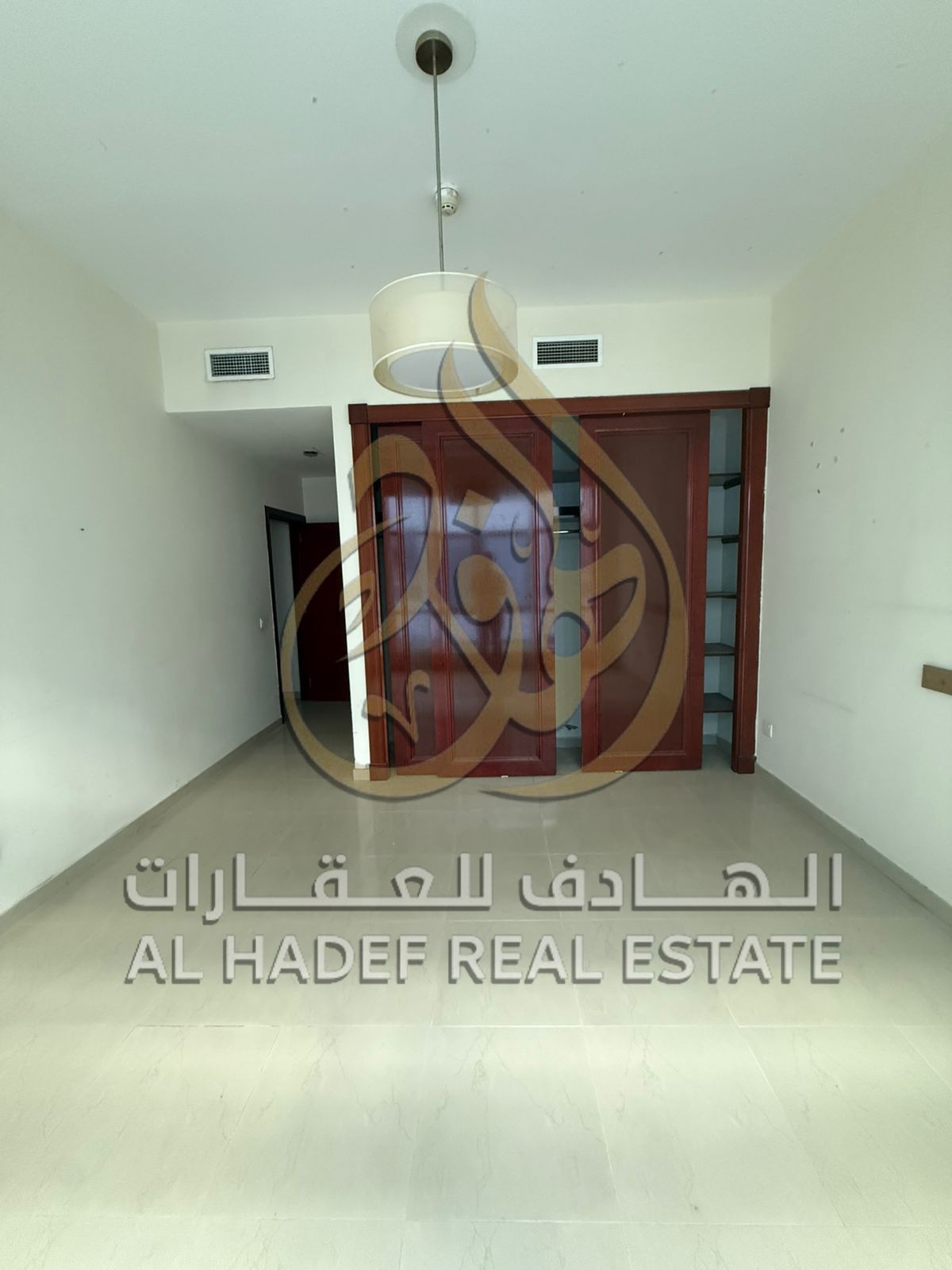 Two-bedroom apartment with living room, air conditioning, gym, and free swimming pool – Al Taawun