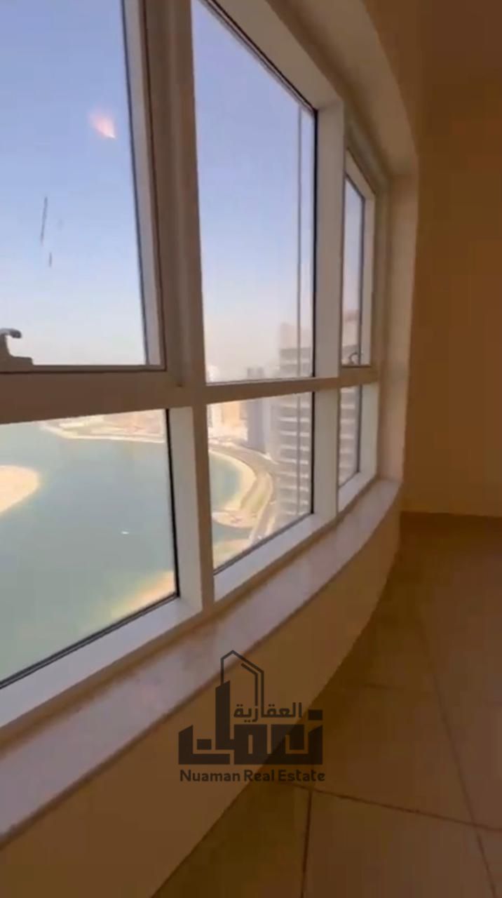 Bedroom Apartment for Sale in Al Khan, Sharjah with Open Sea View, Balcony, Maid Room, 3 Bathrooms, Equipped Kitchen, Luxury Tower with Pool, Gym