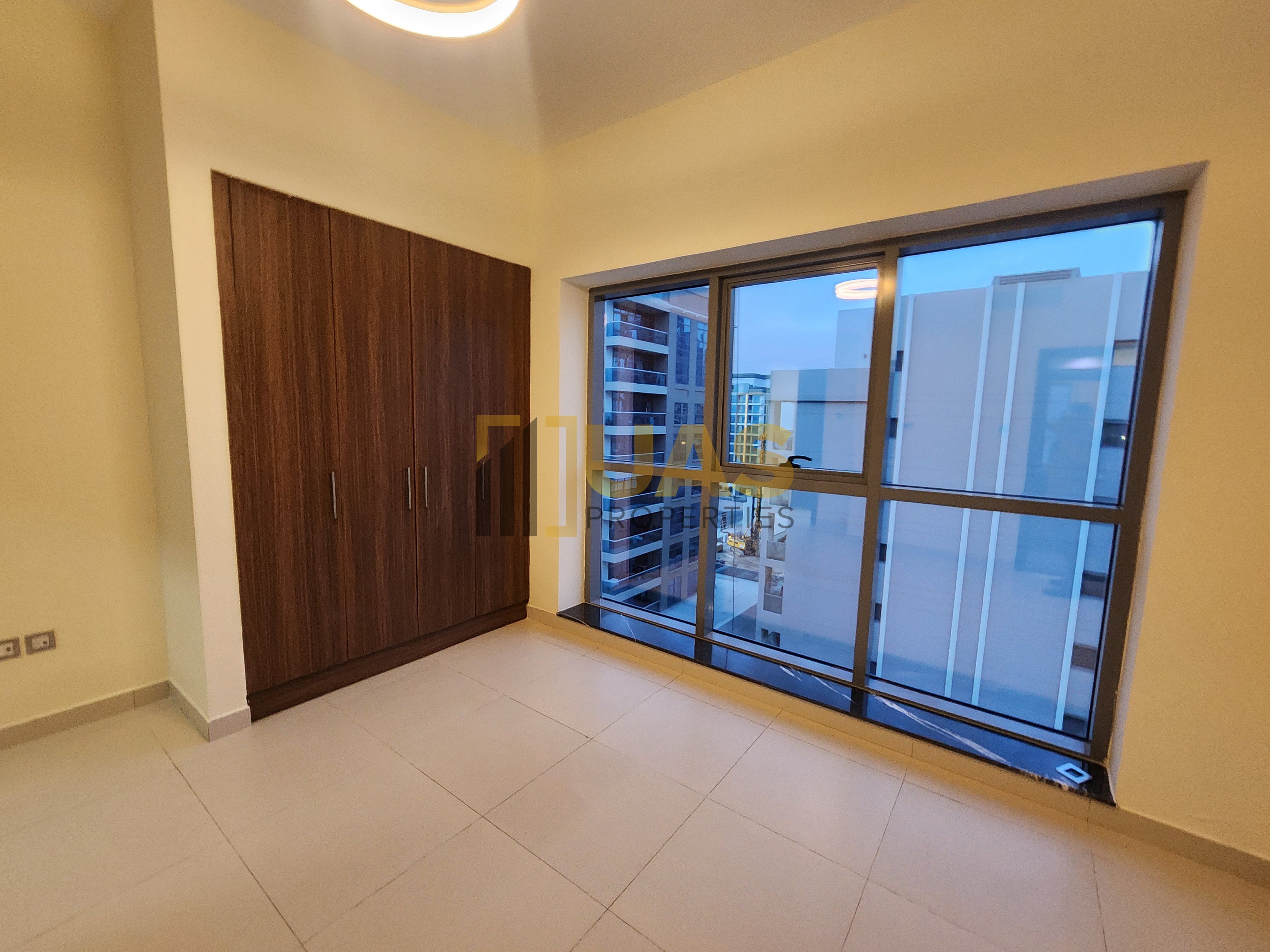 Spacious 2bhk with stor room gym pool parking free near to Metro station