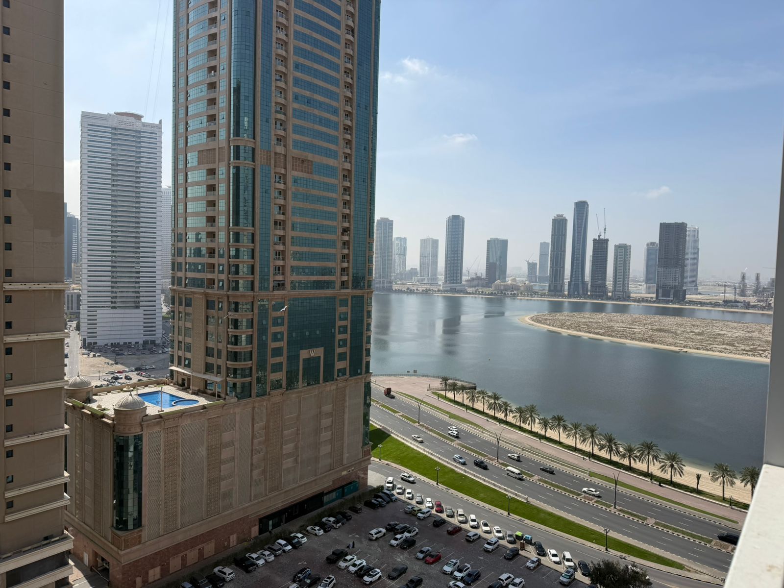 Free parking | Balcony with open & sea view | Spacious layout | Prime location | Easy access to Dubai entrance