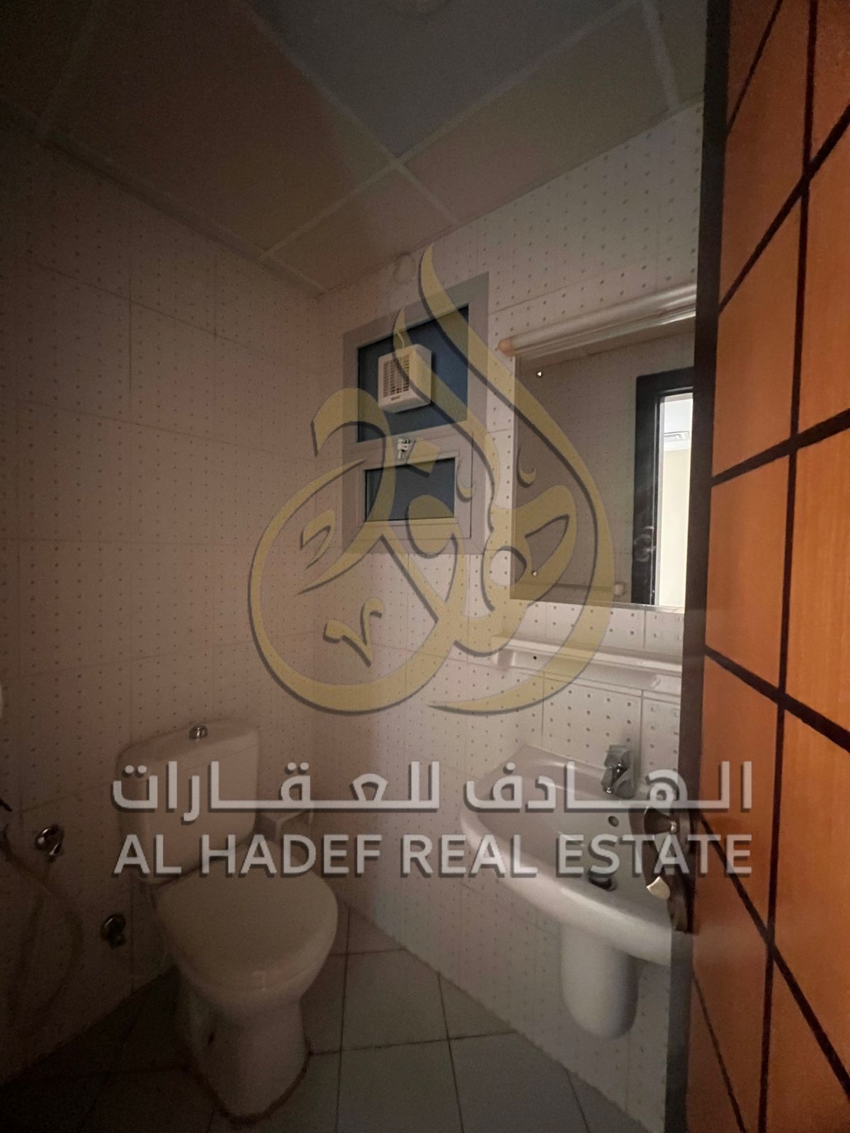 A well-designed one-bedroom apartment with a living area and two bathrooms, located in Al Qasimia. The layout offers comfort, privacy, and effici