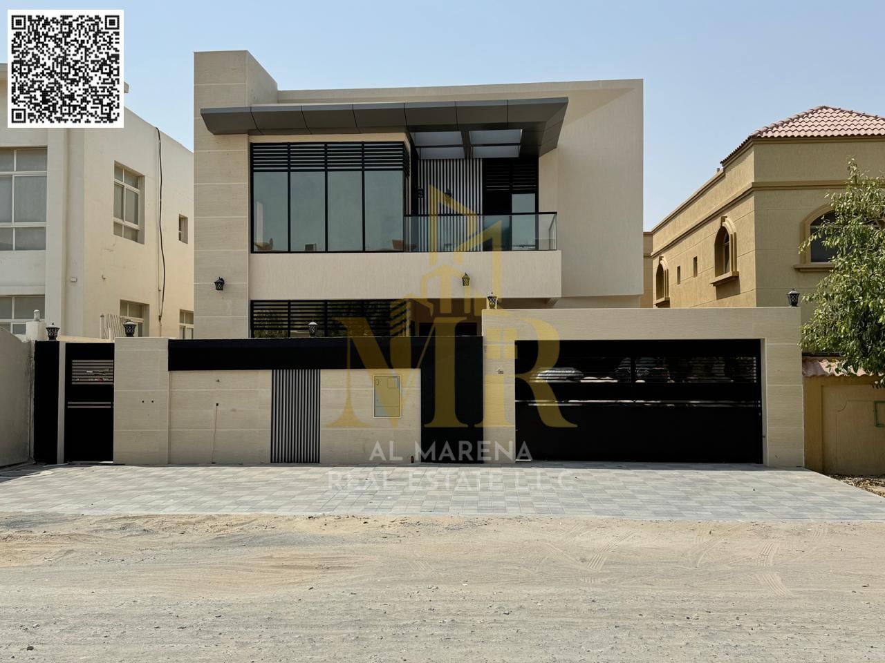 Luxury villa for sale in Al Rawda, 2 commercial units, 5 master bedrooms, majlis and 2 living rooms, price includes electricity, air conditioning and