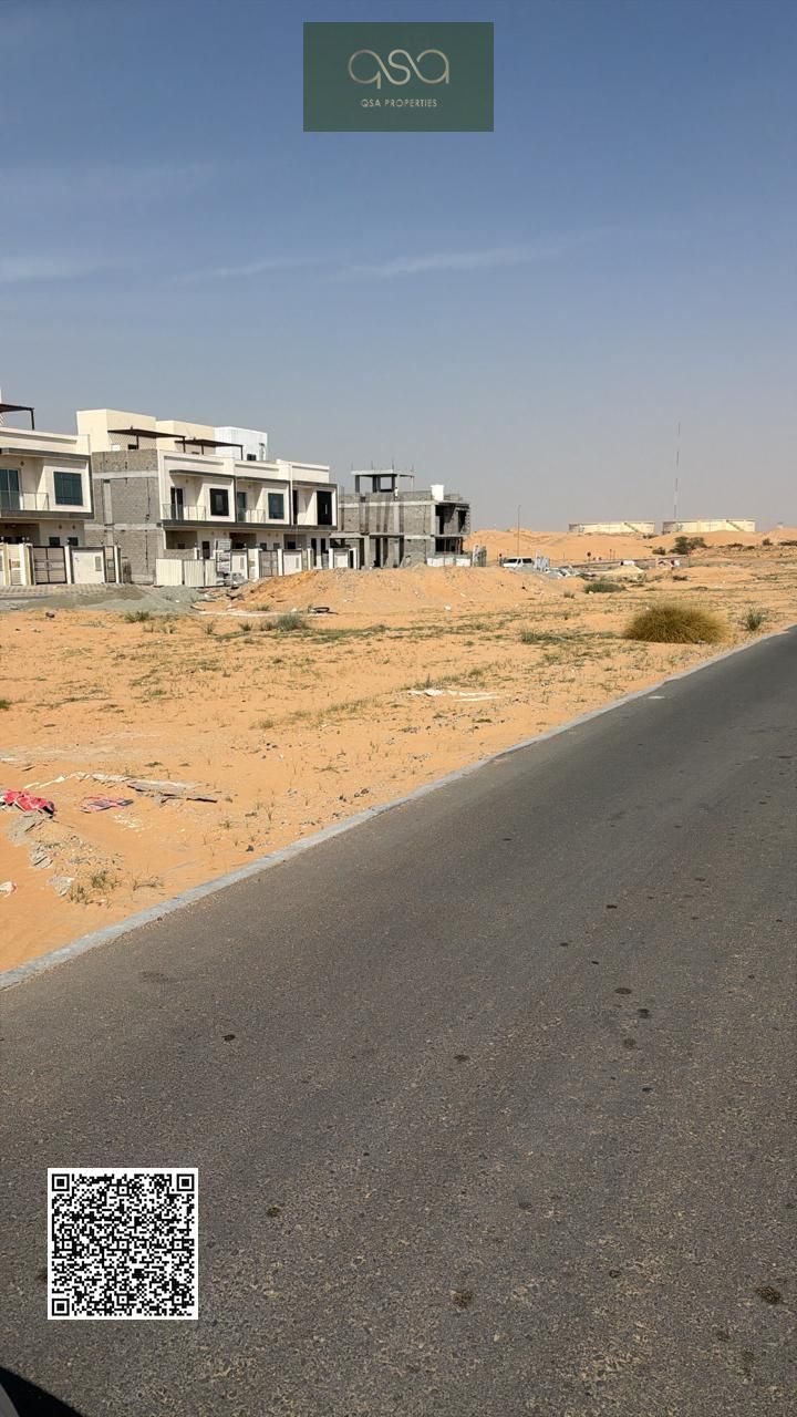 A golden opportunity not to be missed! Commercial land plots in Al Helio 2, a vibrant area with villas and residents, near the Azha community and Shei