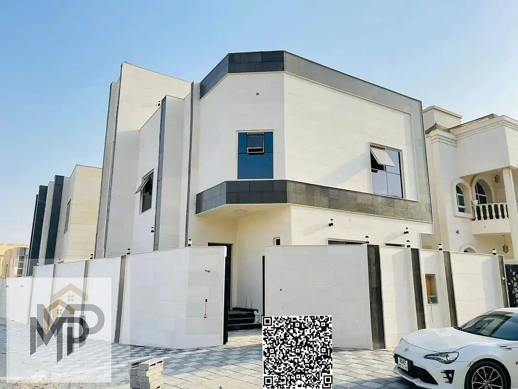 Corner villa, two floors and a roof, for sale in Al Yasmin, behind the park.