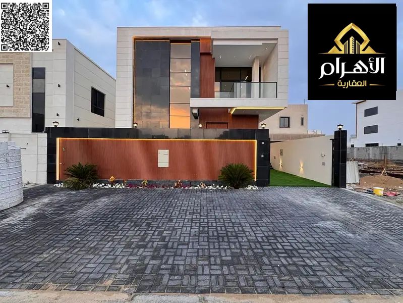 Luxury villa for sale in Al Bahia | 4 master bedrooms | Private pool + rooftop | Majlis + large living room | 2 kitchens | Free registration