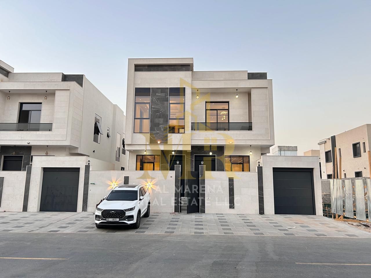 A villa in Al Bahia, freehold, available to all nationalities, price includes air conditioning.