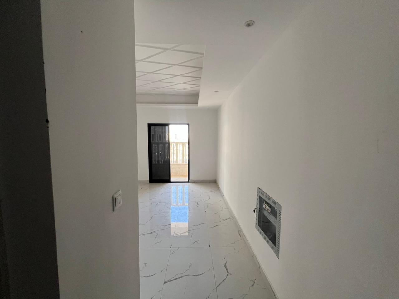Two bedrooms and a living room - Al Aaliyah, Ajman - First occupancy - Central air conditioning - Free maintenance - Two master bedrooms