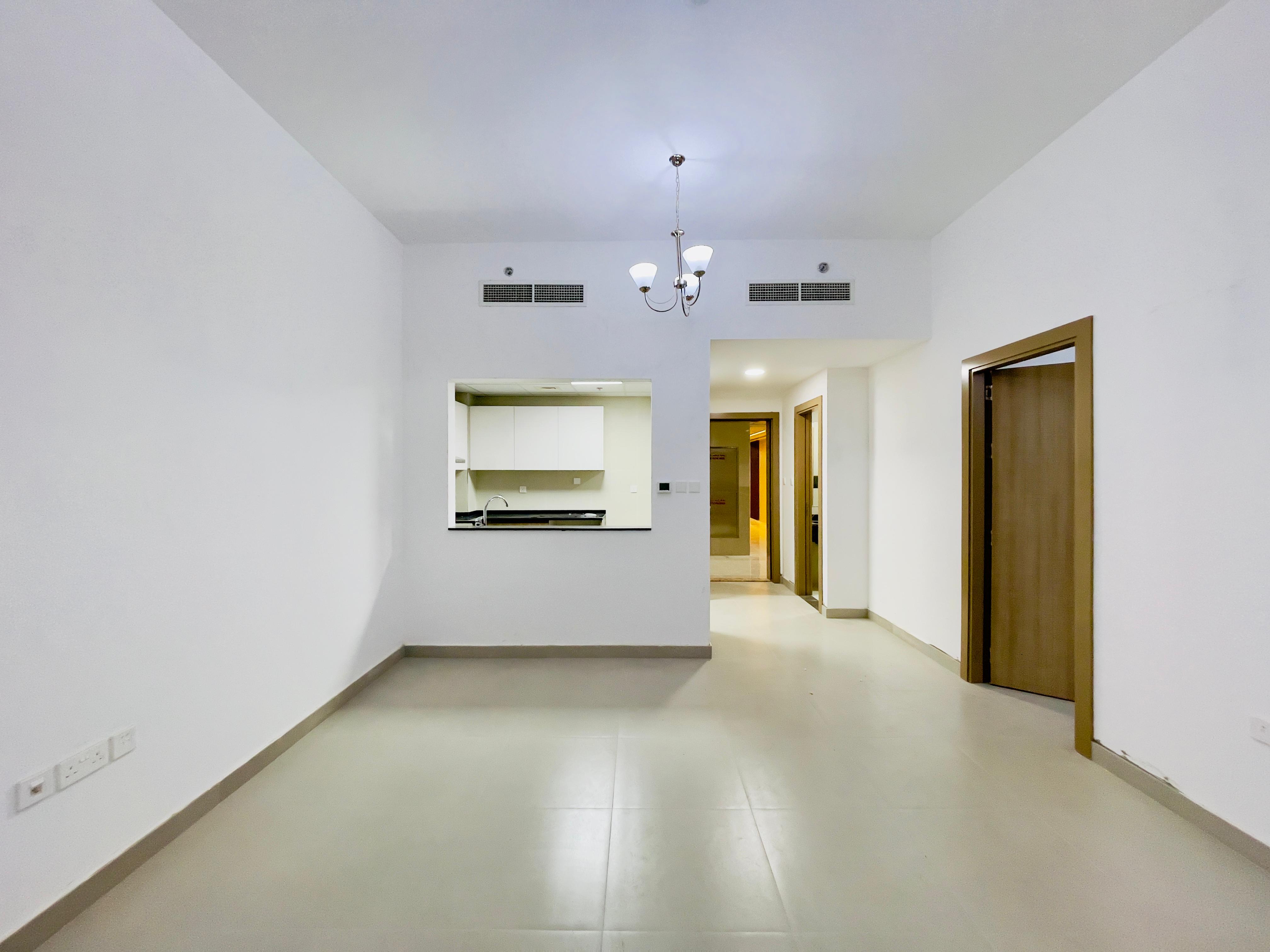 BRAND NEW BUILDING LUXURY LIVING SPACIOUS 1 BEDROOM WITH 2 BATHROOMS WITH BALCONY BUILT IN WADROBS GYM POOL PARKING FREE ON PRIME LOCATION CONTACT