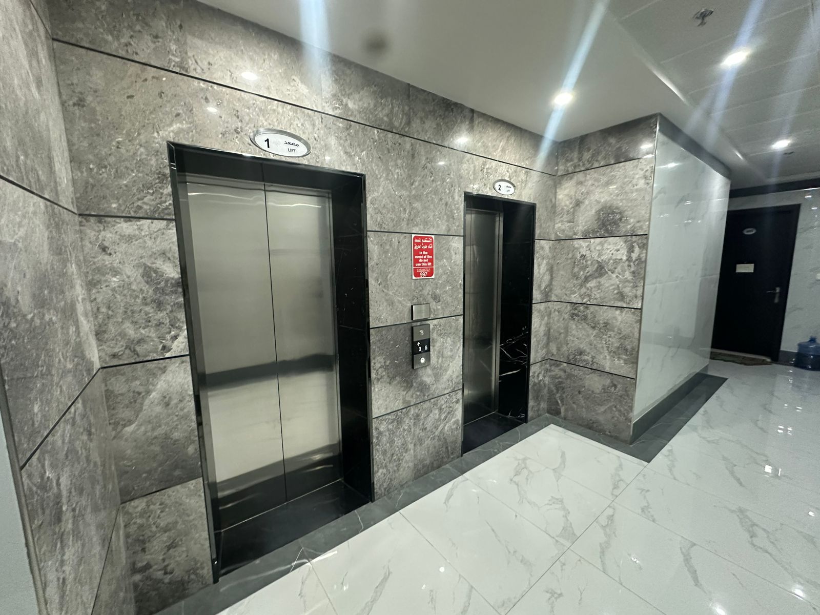 Two bedrooms and a living room in Al Mowaihat 3, large area, three bathrooms, with a balcony facing the main street, next to Ajman Academy and close t