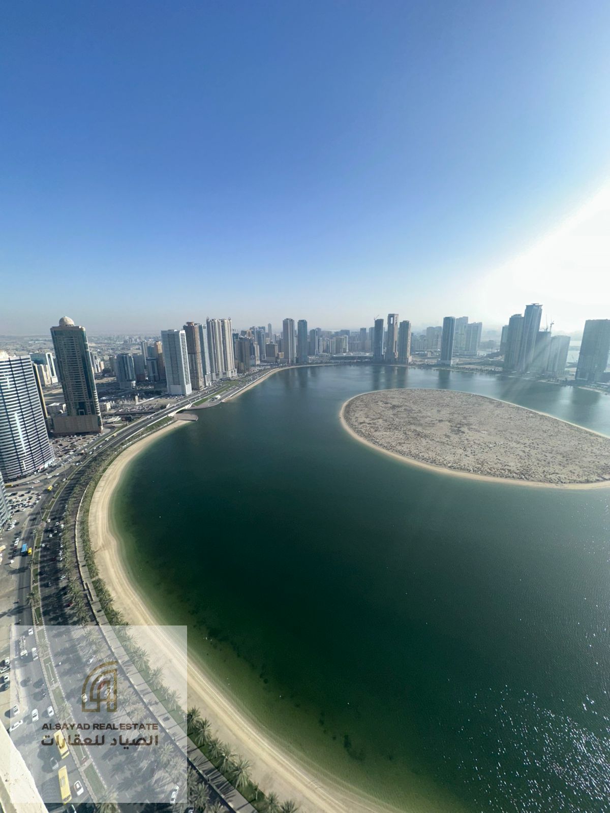 For sale: 2-bedroom apartment with living room in Al Khan, 200 sqm, with private parking. Service charges AED 9,500 annually. Price AED 1,200,000. Gre