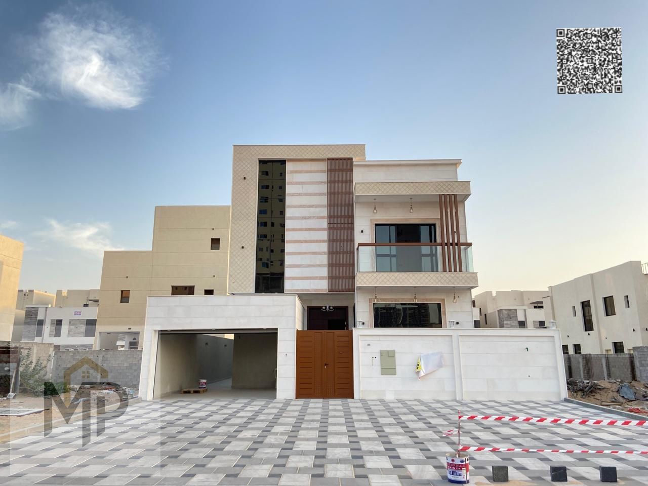 A villa with high area and finishes for sale with a good cash discount in Al Amira, Ajman