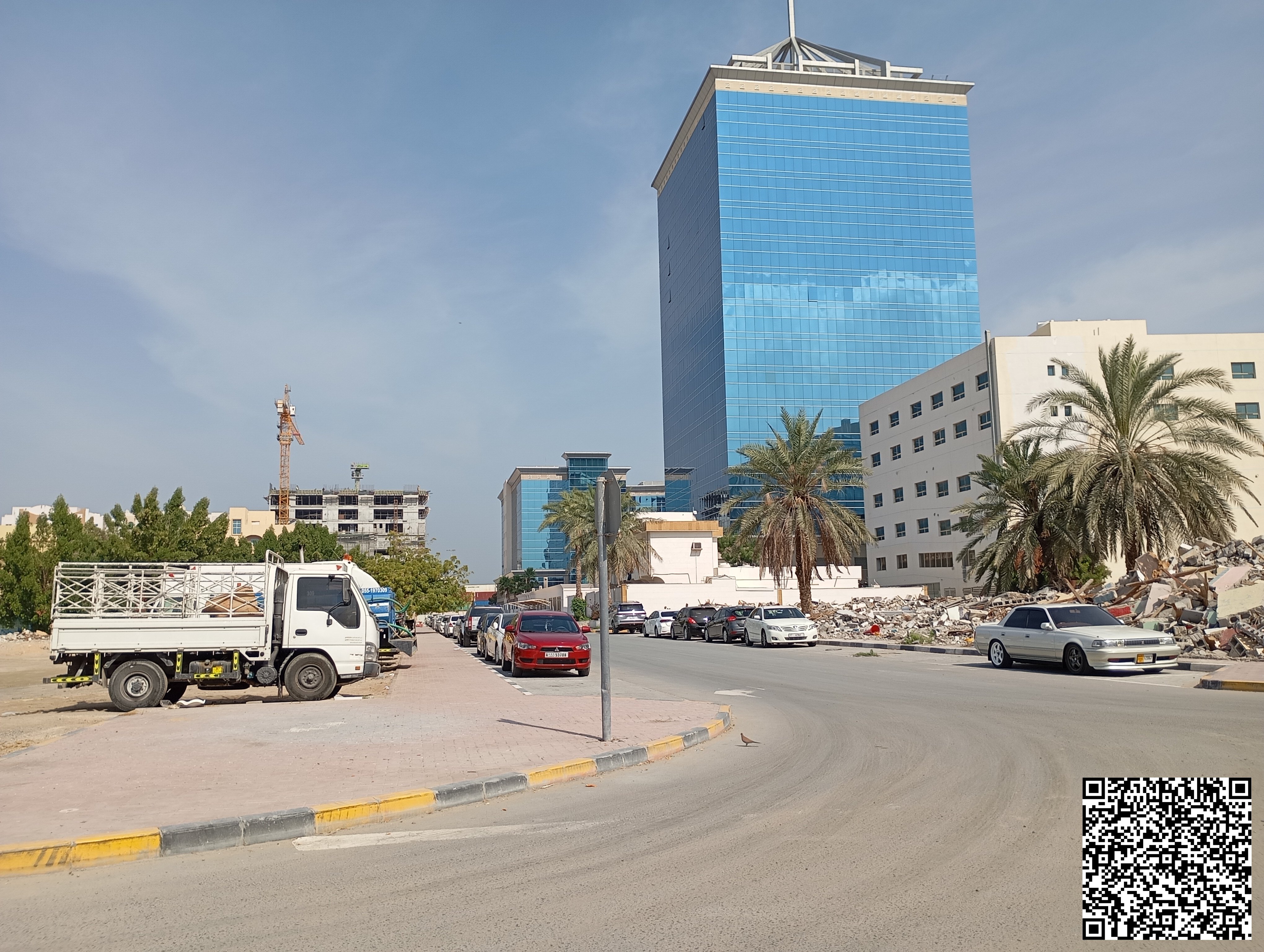 Land on a road and service lane in Liwara, Ajman, near the Free Zone.
