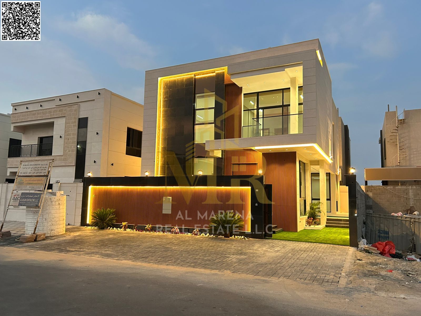 A villa for sale in Al Bahia, with all registration and ownership fees included, located on the main street and ready for immediate occupancy in one o