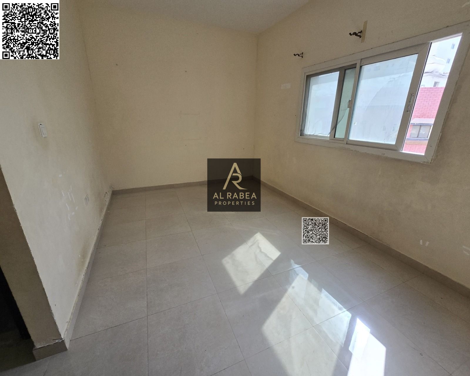 For annual rent in Ajman, Al Alia area, near Mohammed Bin Zayed Road exit. Two bedrooms and a living room with three bathrooms and a balcony. Annual r