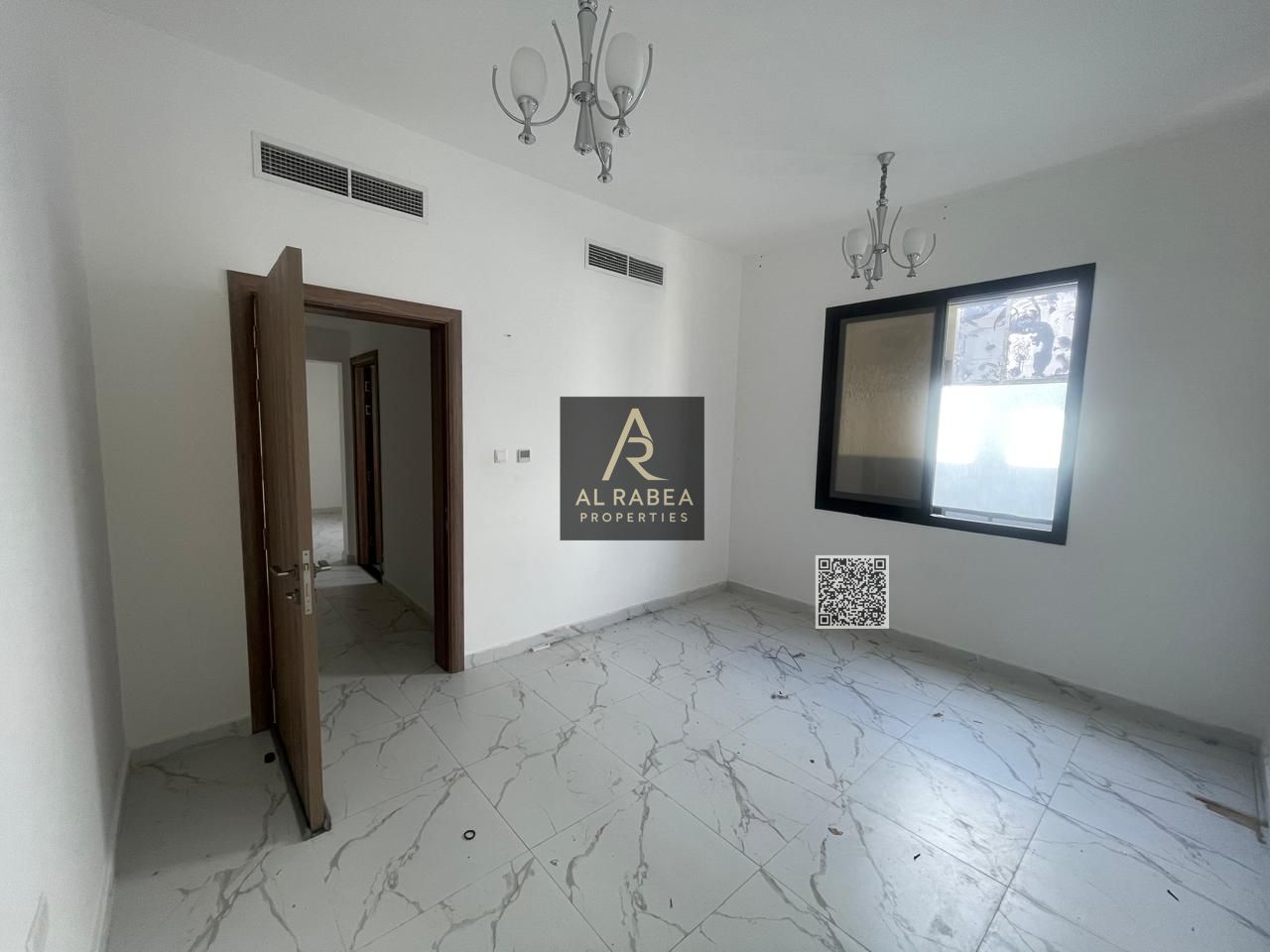 For annual rent in Ajman, Al Alia area, near Mohammed Bin Zayed Road exit. One bedroom and a living room with two bathrooms and a balcony. Annual re